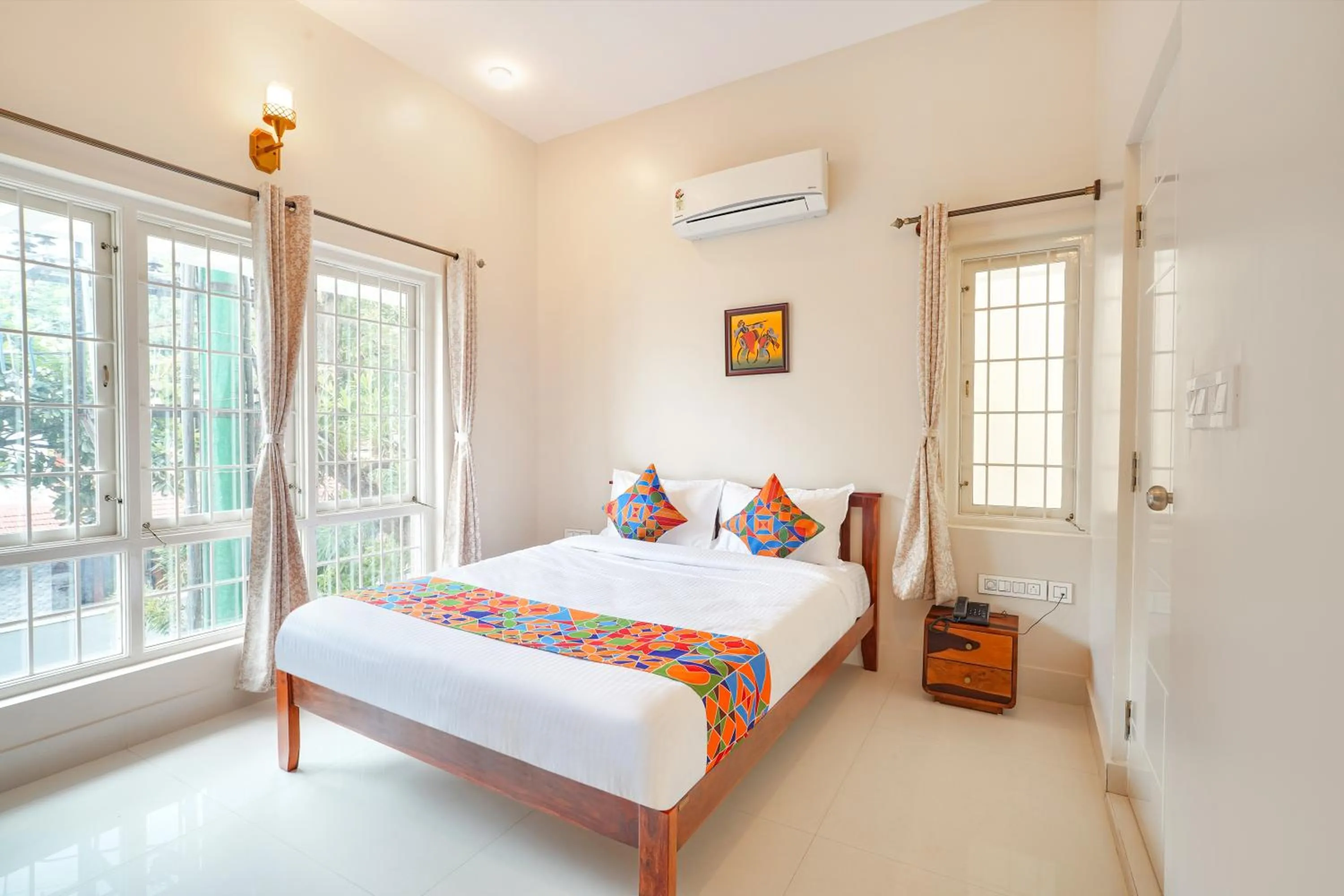 Bed in FabHotel Bougainvillea Suites - Horamavu