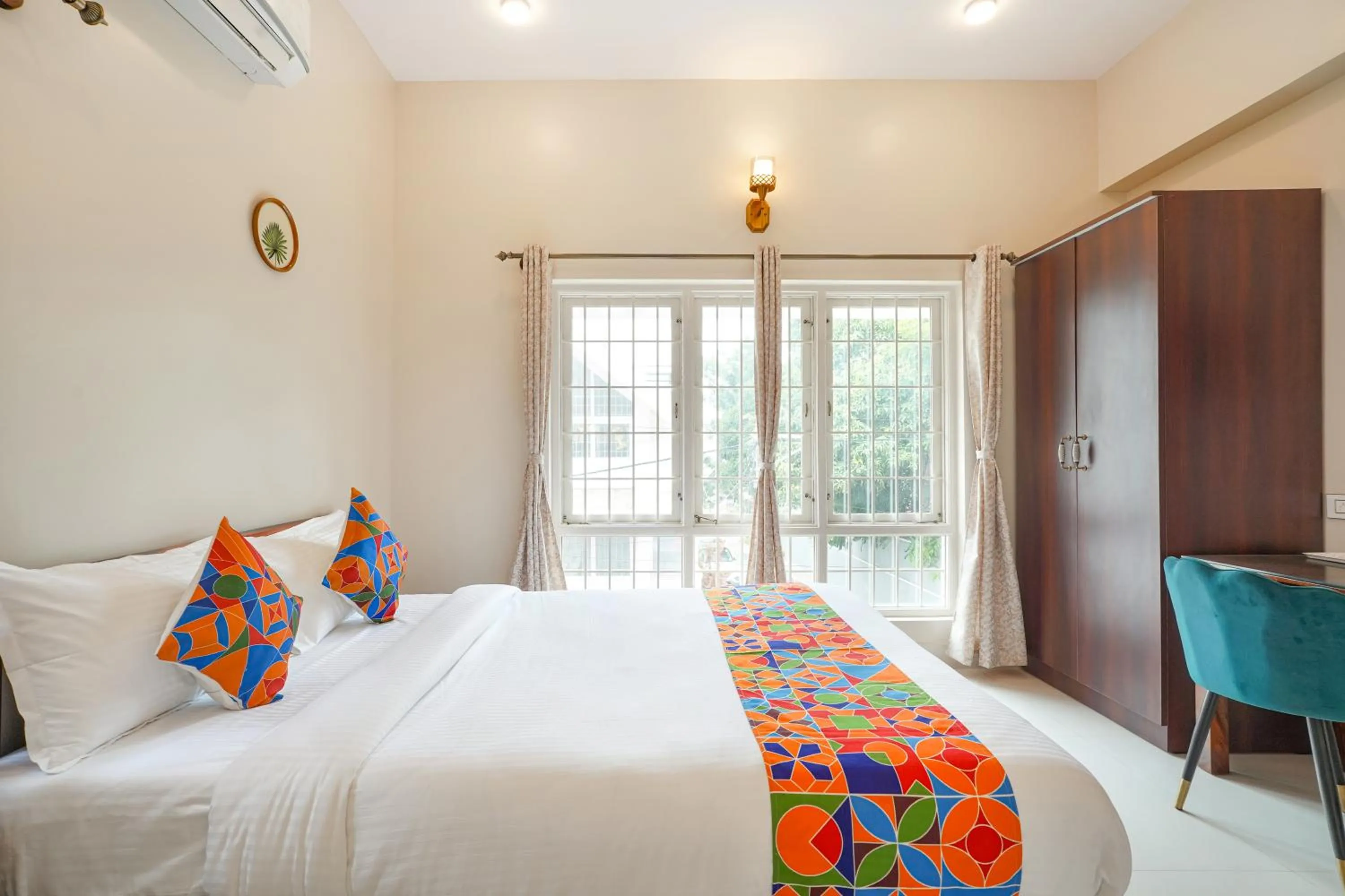 Bed in FabHotel Bougainvillea Suites - Horamavu