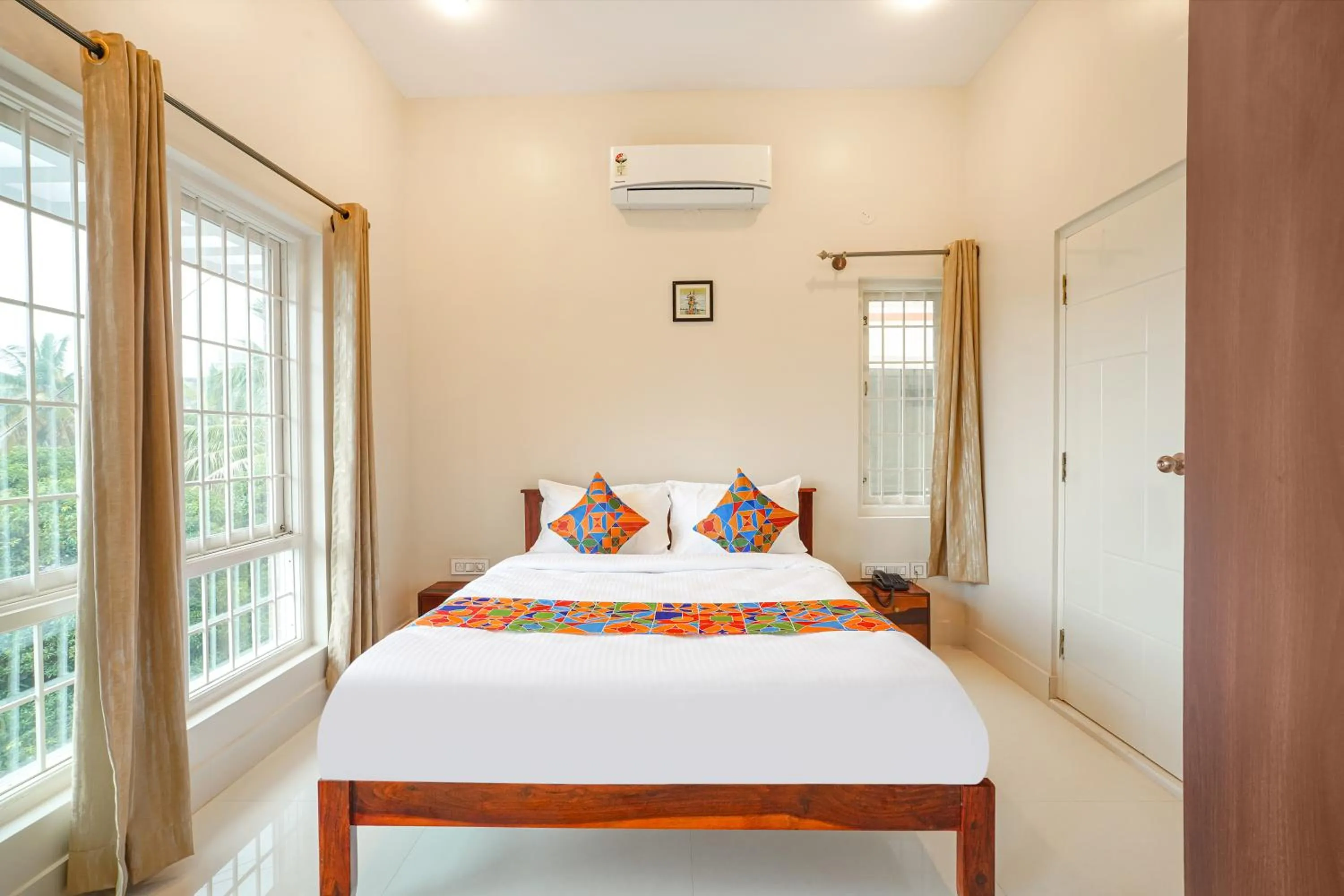 Bed in FabHotel Bougainvillea Suites - Horamavu