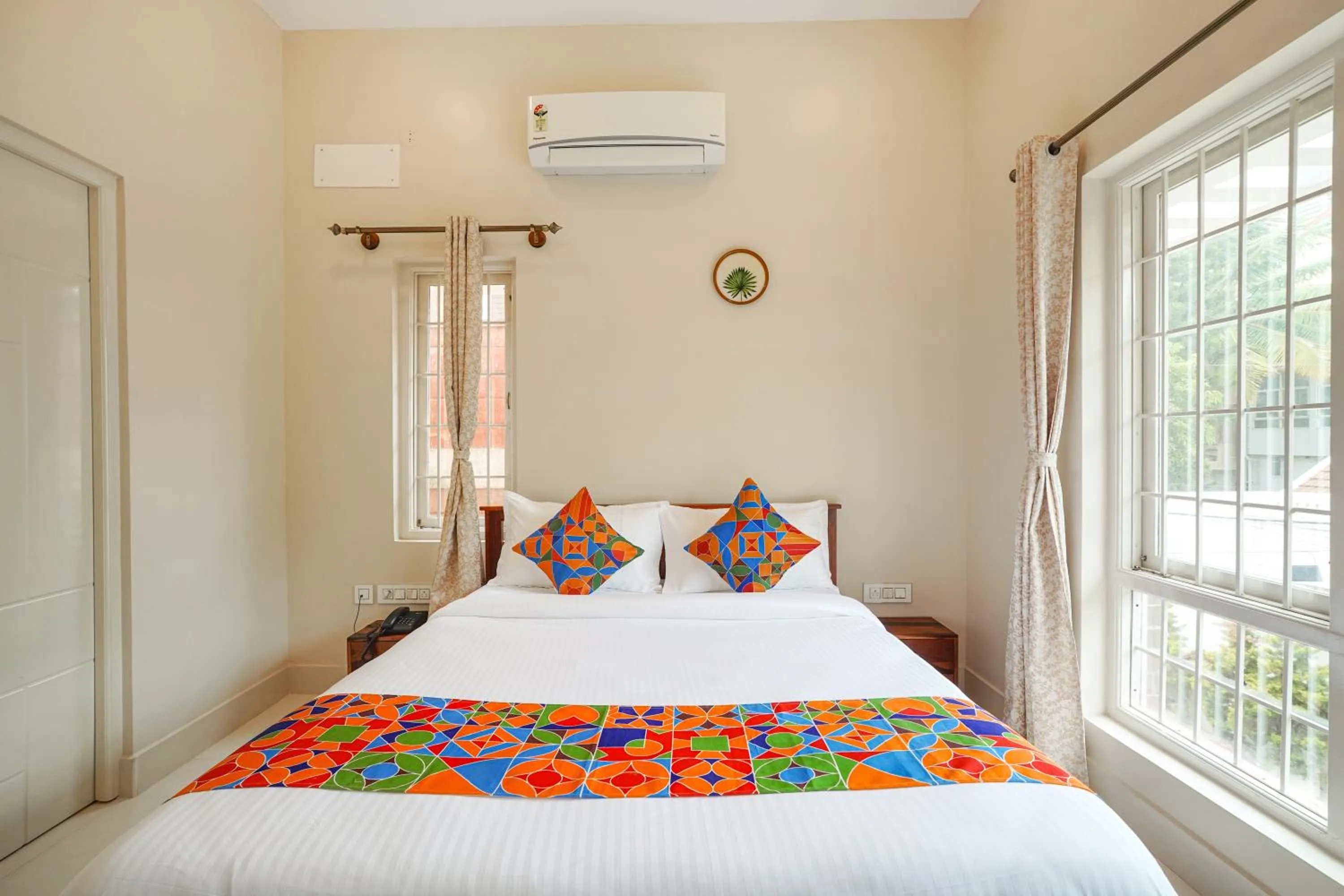 Bed in FabHotel Bougainvillea Suites - Horamavu