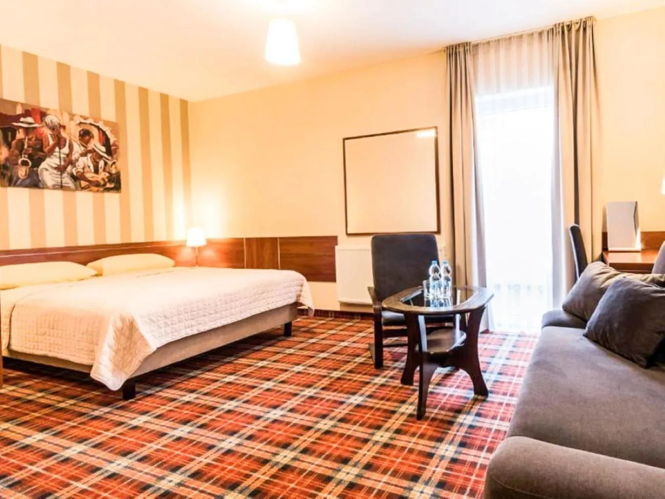 Communal lounge/ TV room, Bed in Hotel Stara Garbarnia