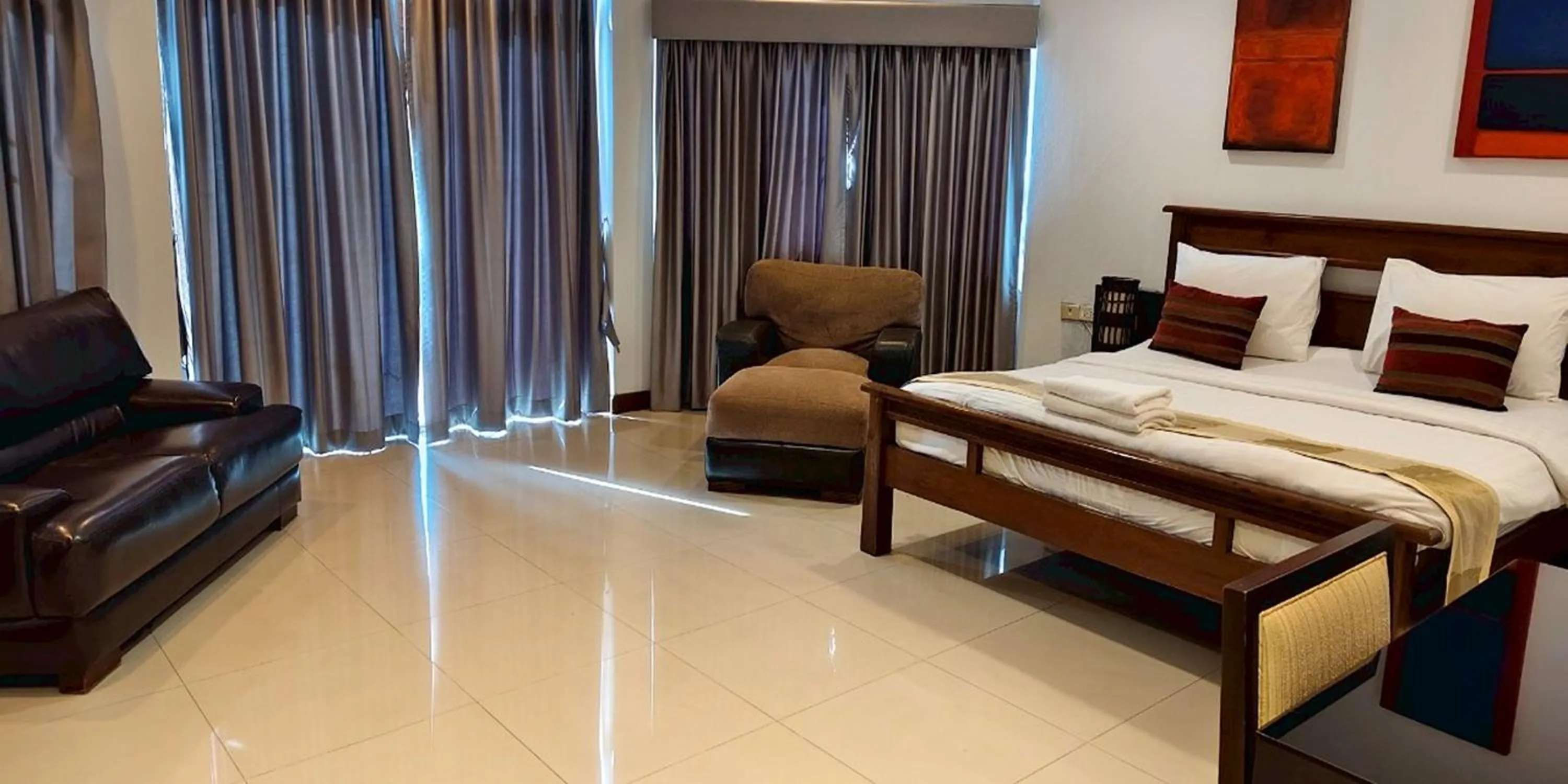 Bed in Gazebo Resort Pattaya