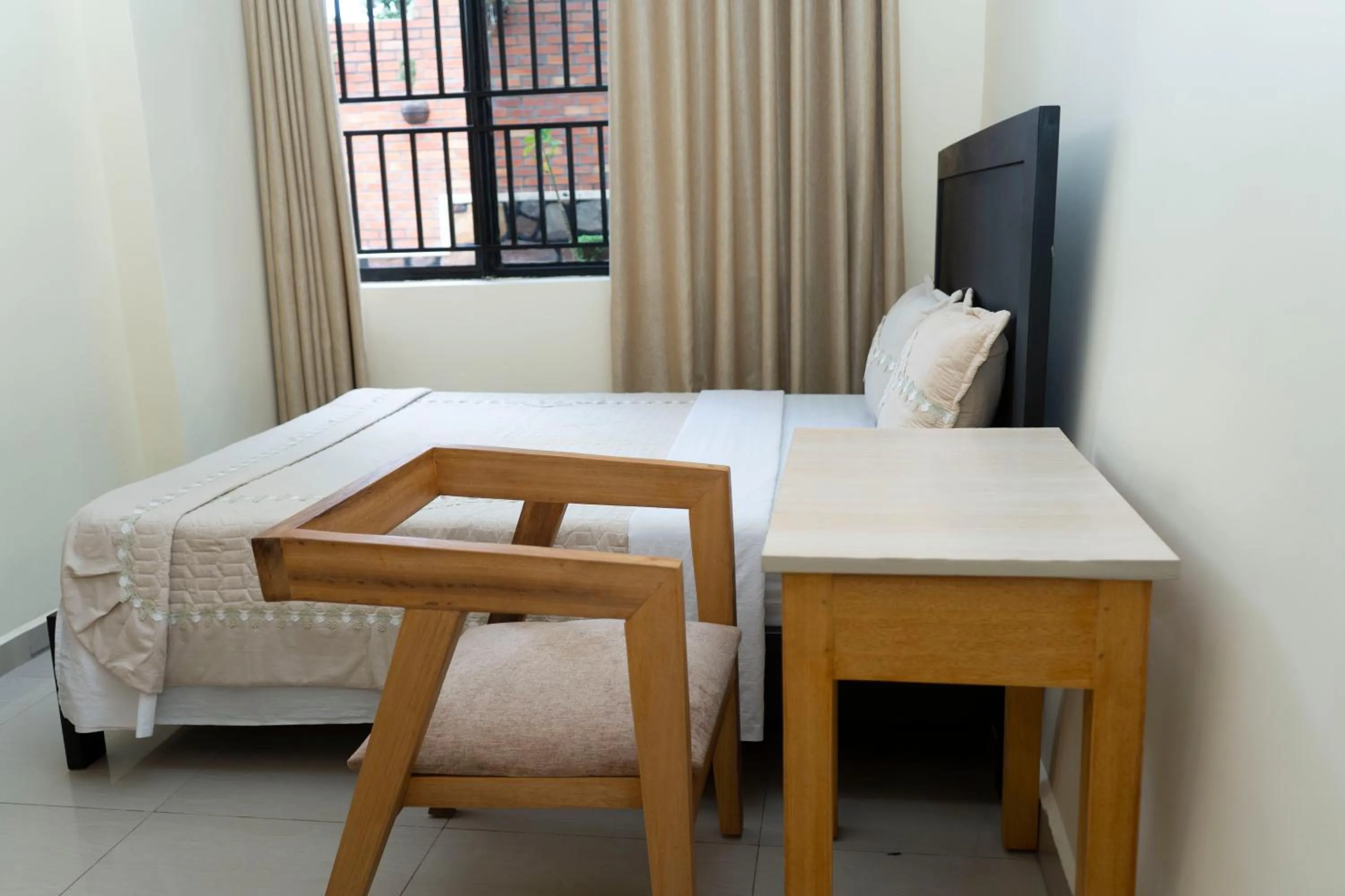 Bed in Green View Apartments