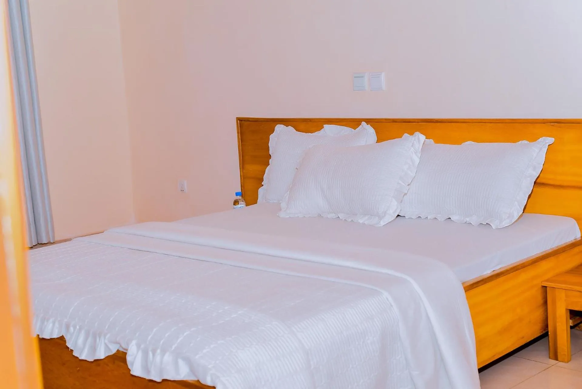 Bed in Green View Apartments