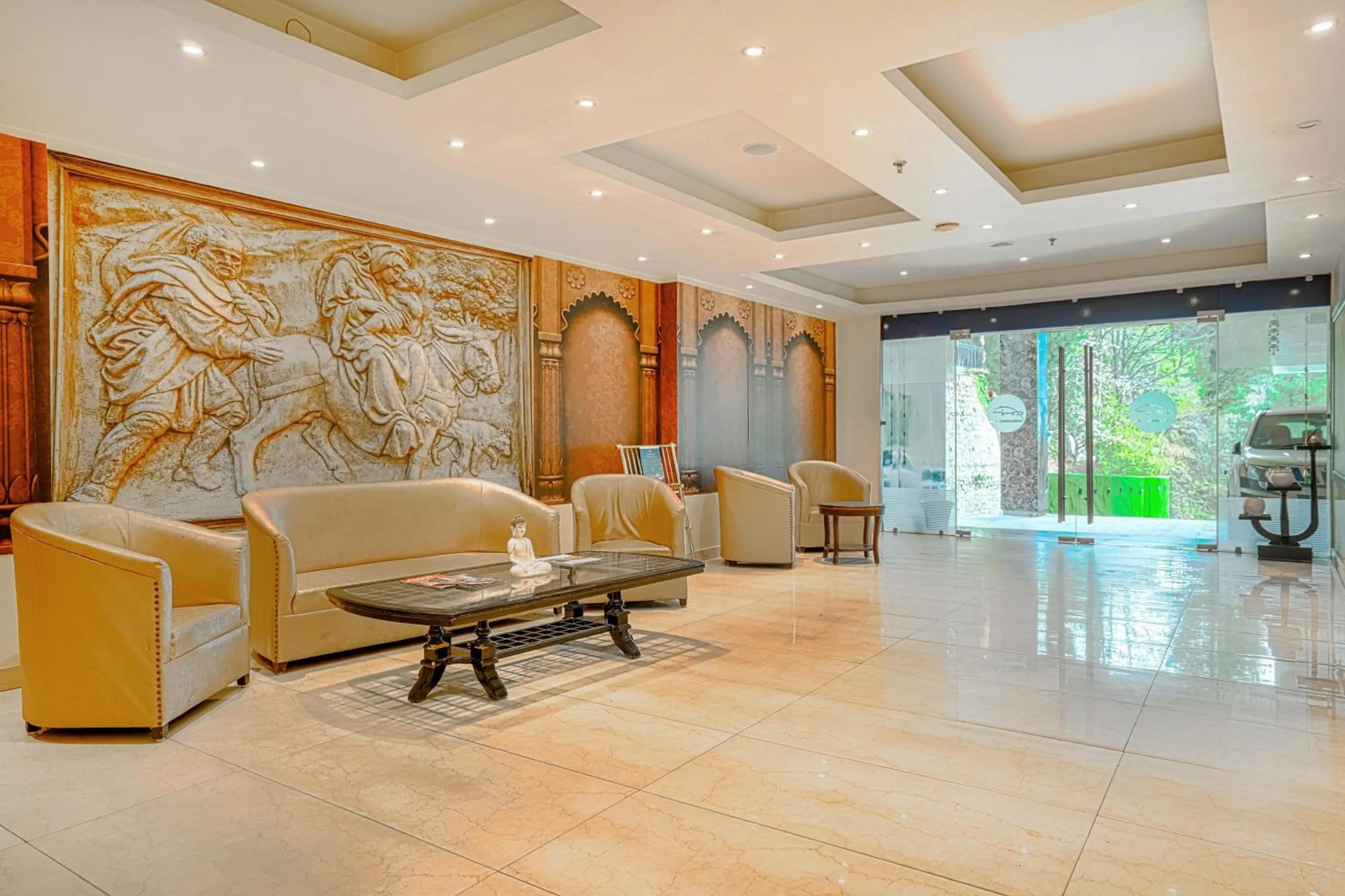 Seating area in Aatmayog Luxury Manor By Blueko Hotels