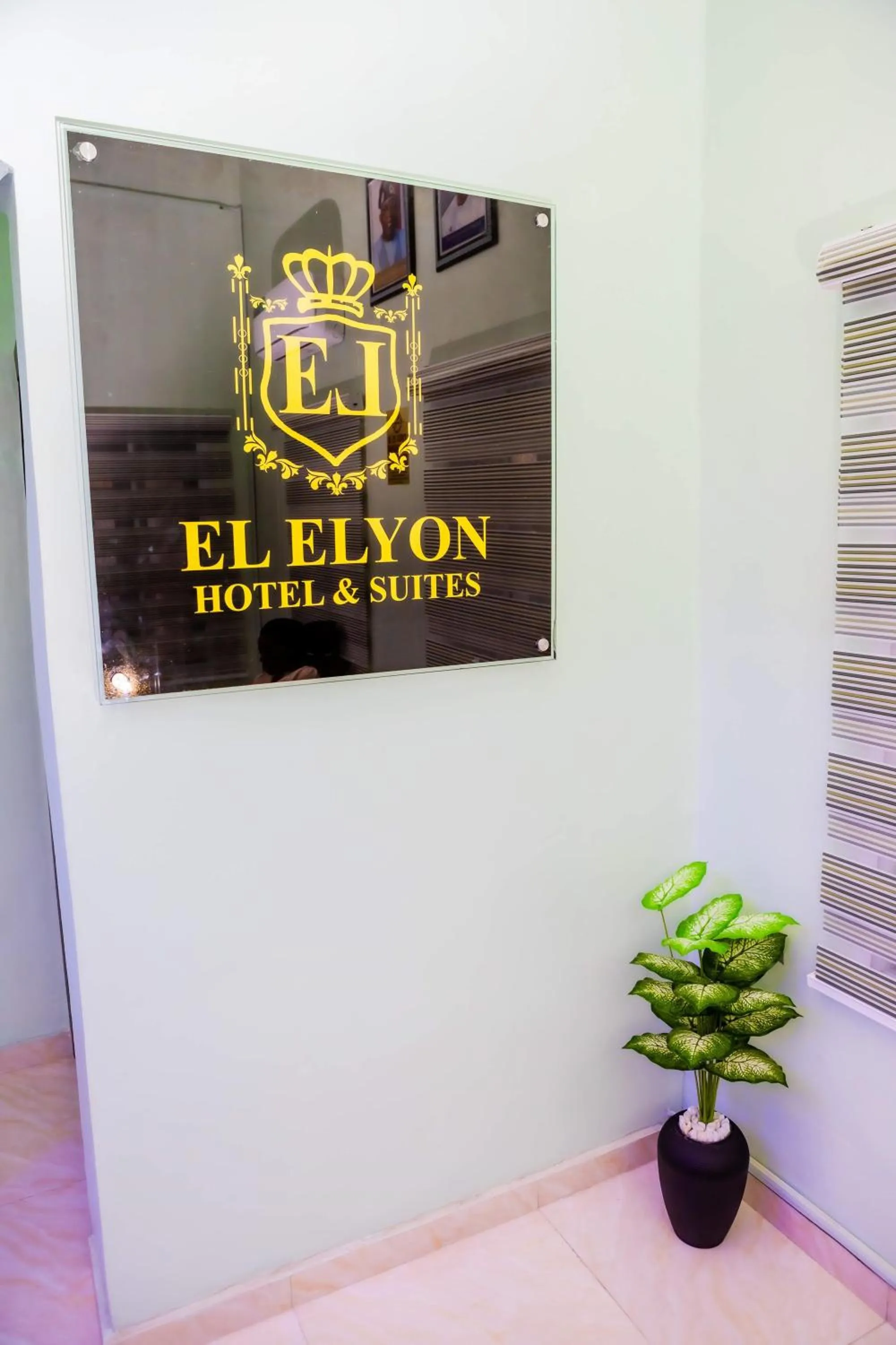 Property logo or sign in El Elyon Hotel and Suites