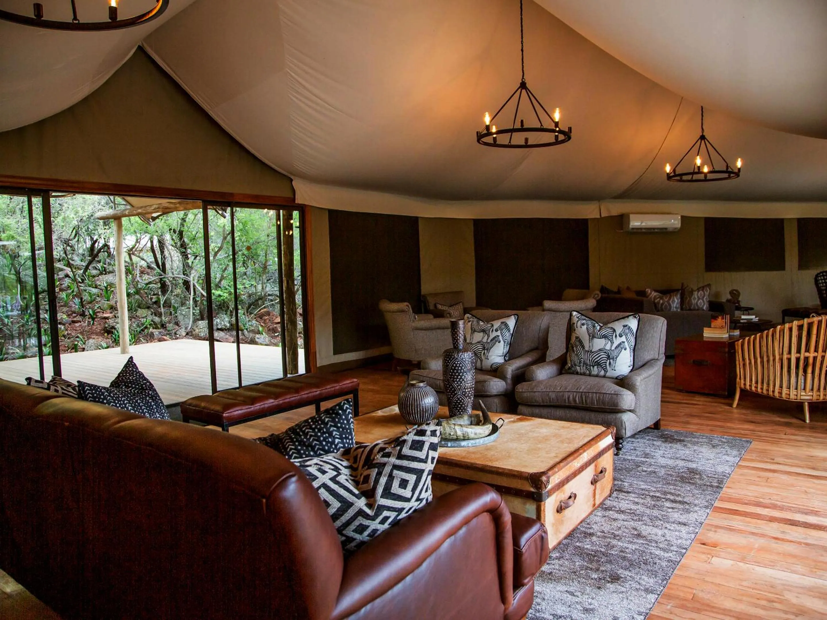 Communal lounge/ TV room in Nkomazi Game Reserve by NEWMARK