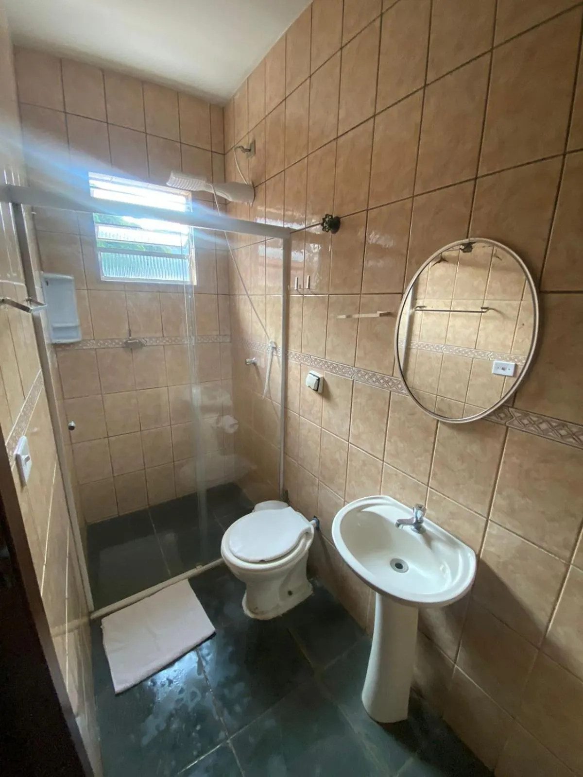 Bathroom in Pousada e Restaurante Frente Mar H Guarujá