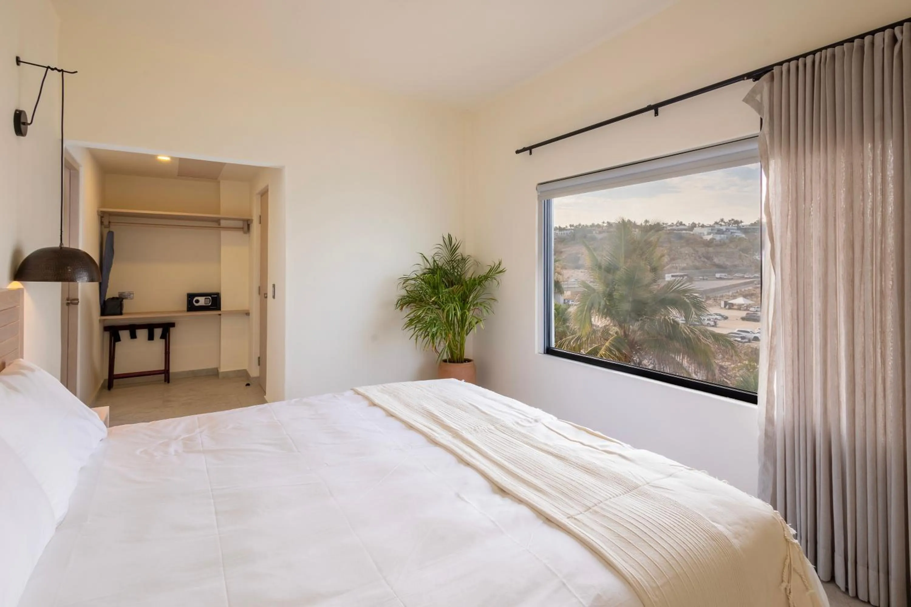 Bed in Cabo Break Hotel