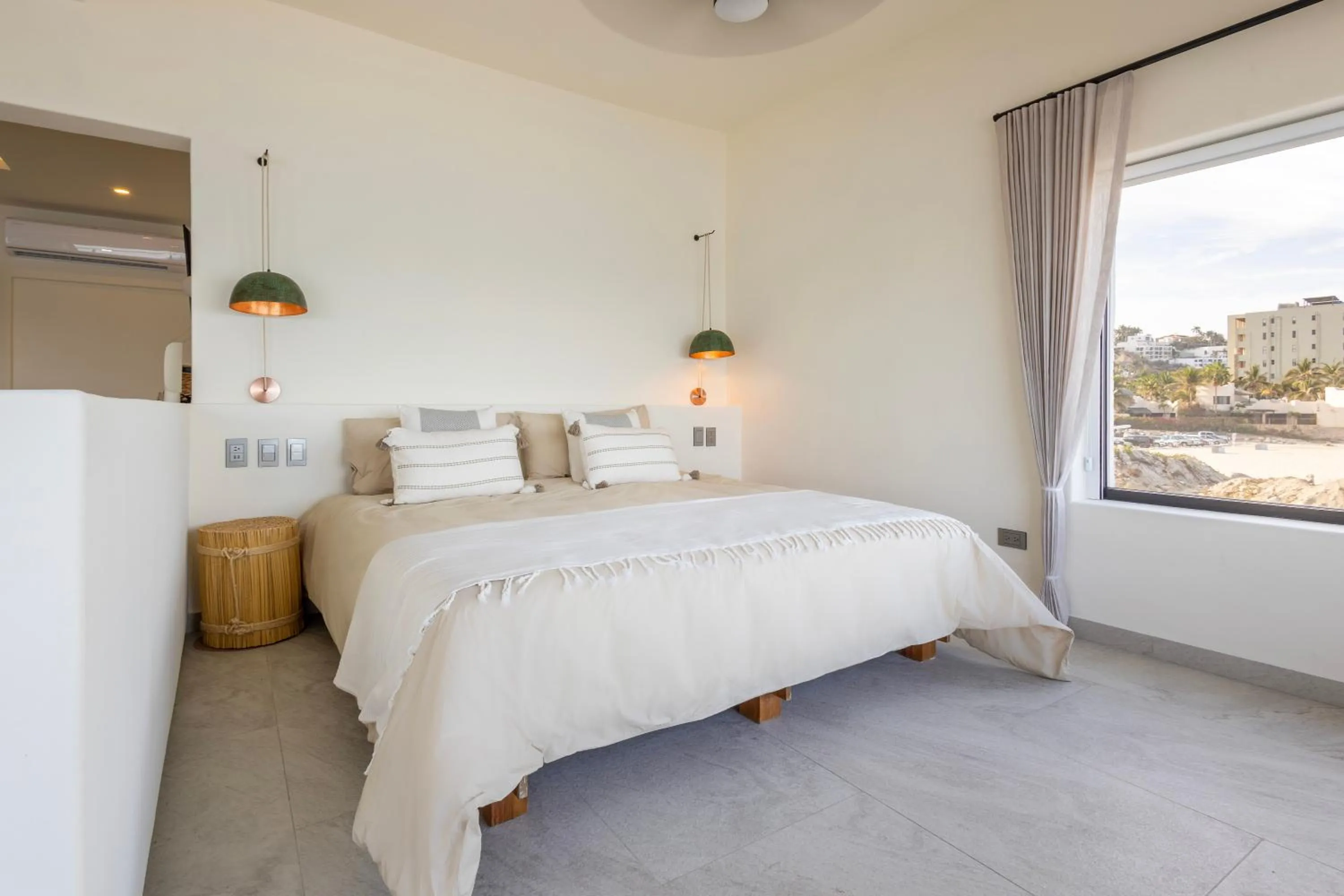 Bed in Cabo Break Hotel