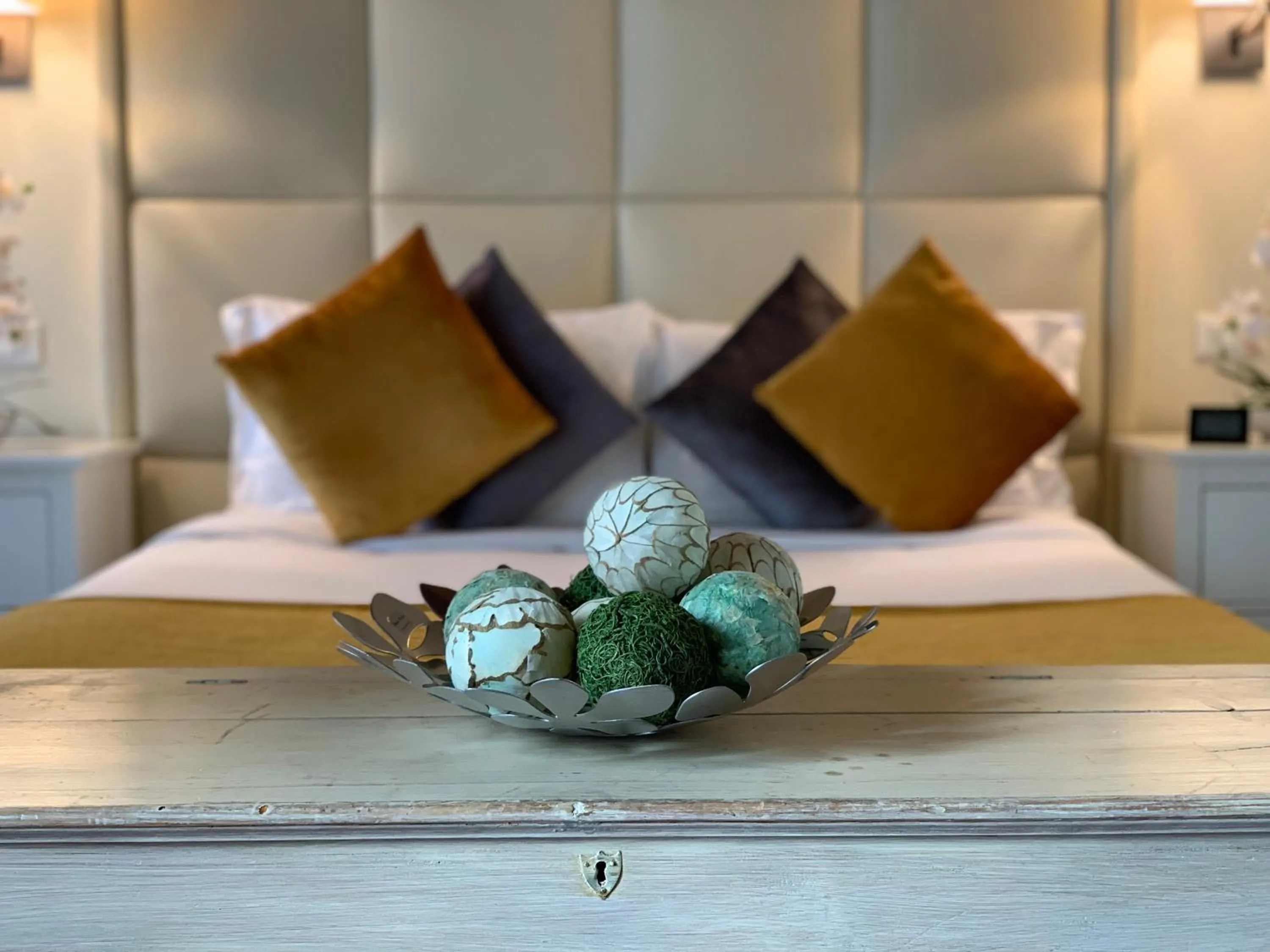 Decorative detail, Bed in Florence Art Apartments