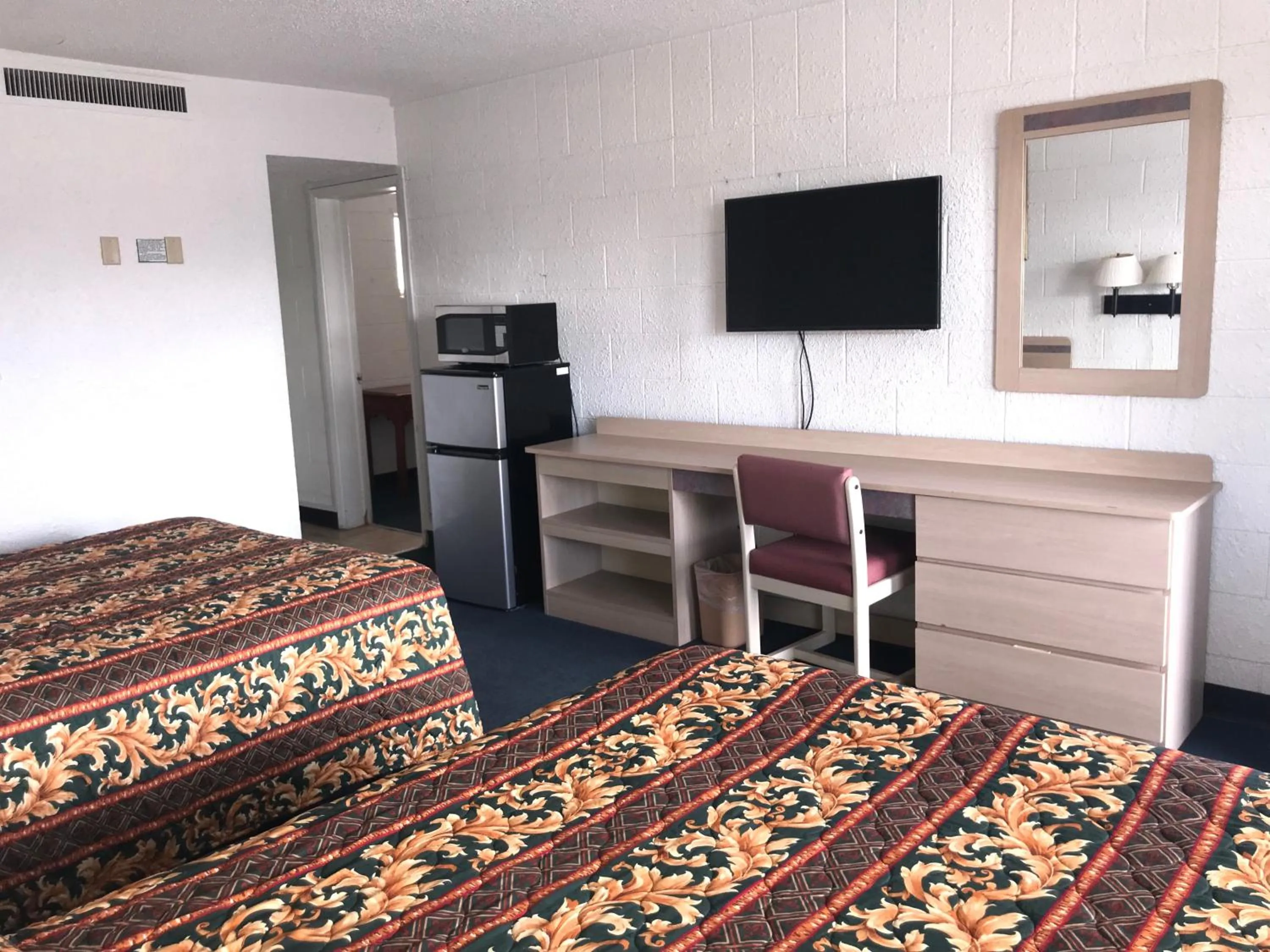 Bed in Super Lodge Motel El Paso