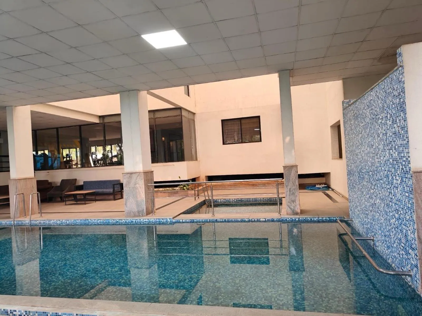 Swimming pool in Hotel O by OYO Local Square Manyata