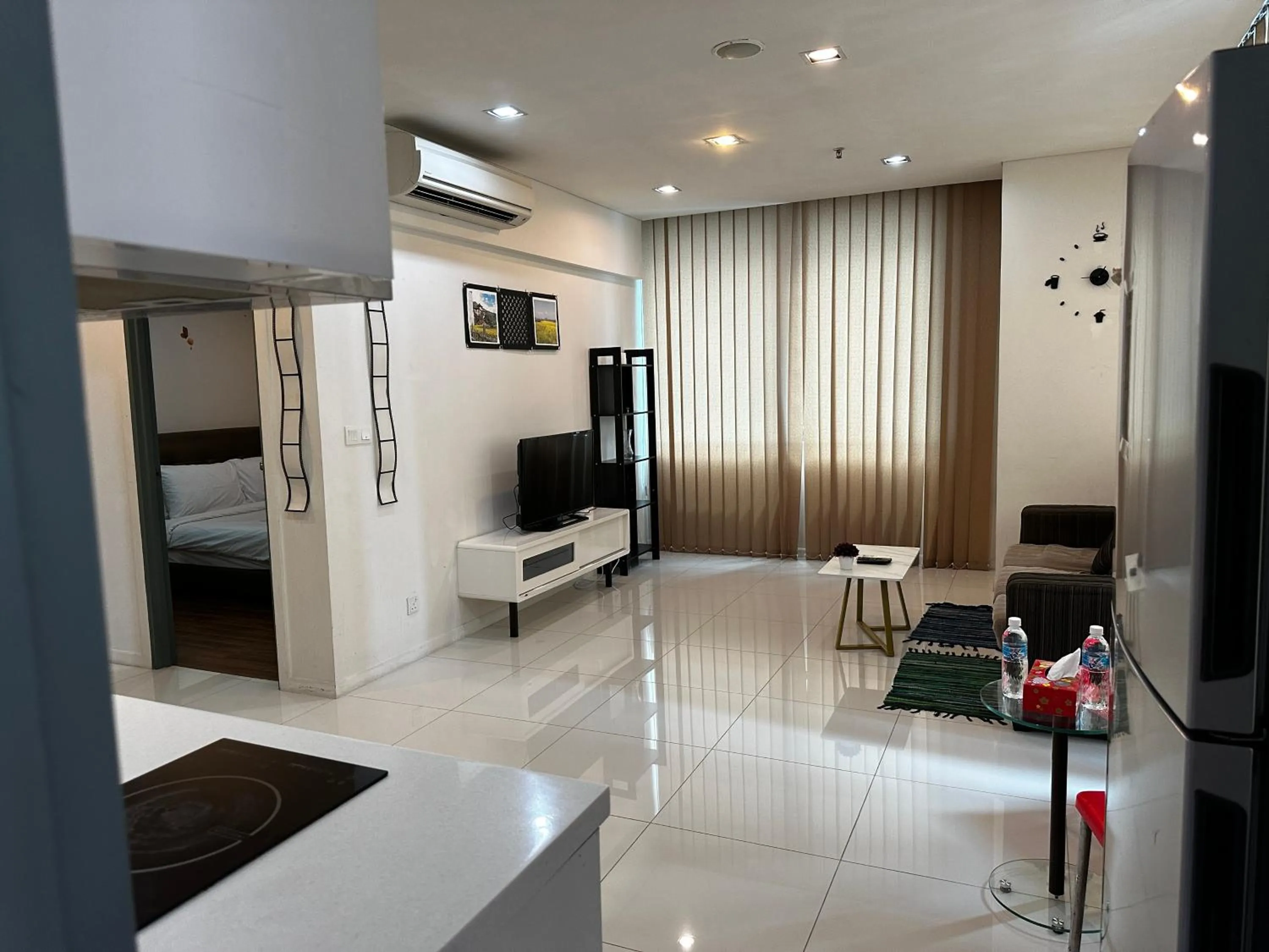 Communal lounge/ TV room, Bed in Summer Suites KLCC by Luna KL