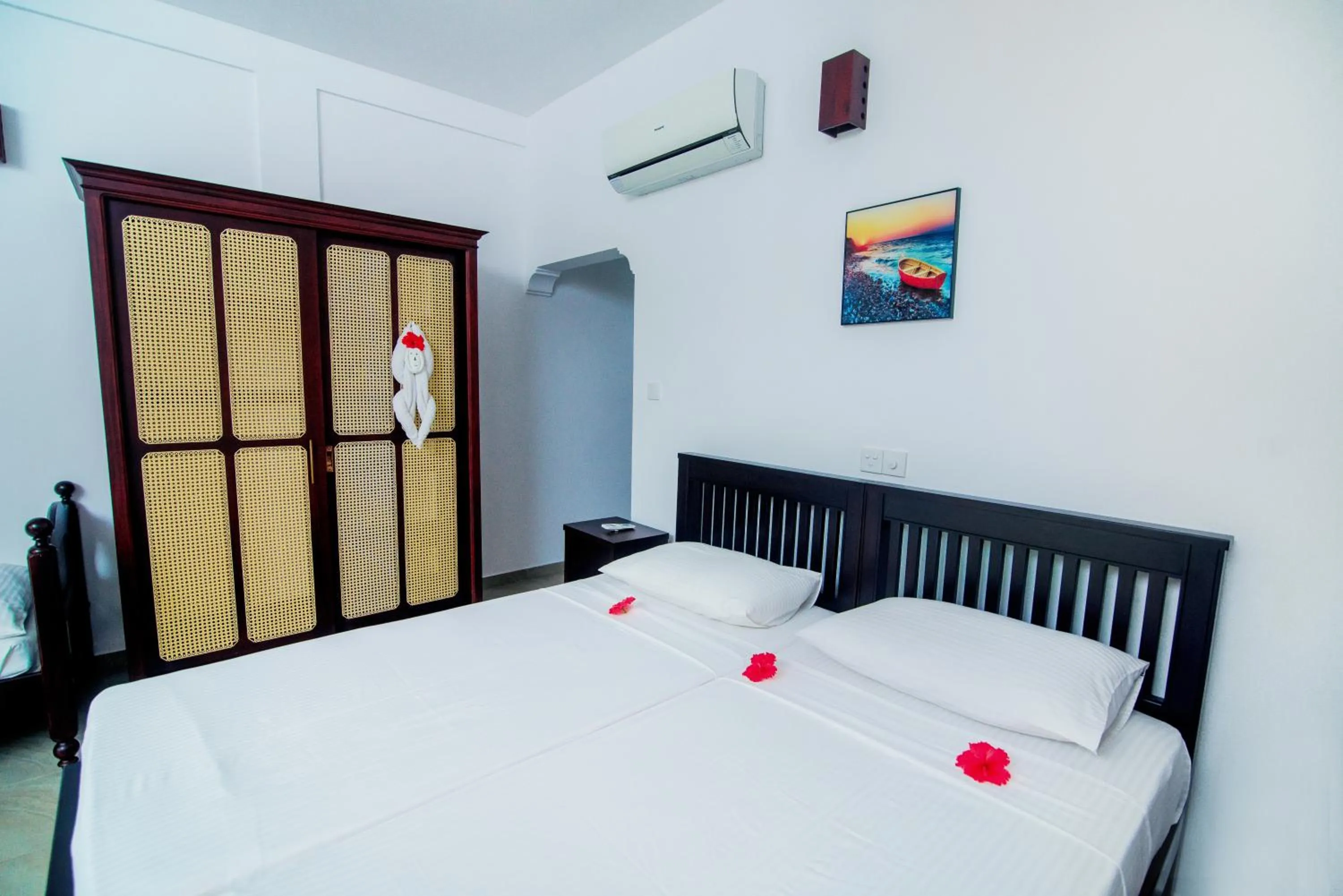 Bed in Lagoon Bentota Resort