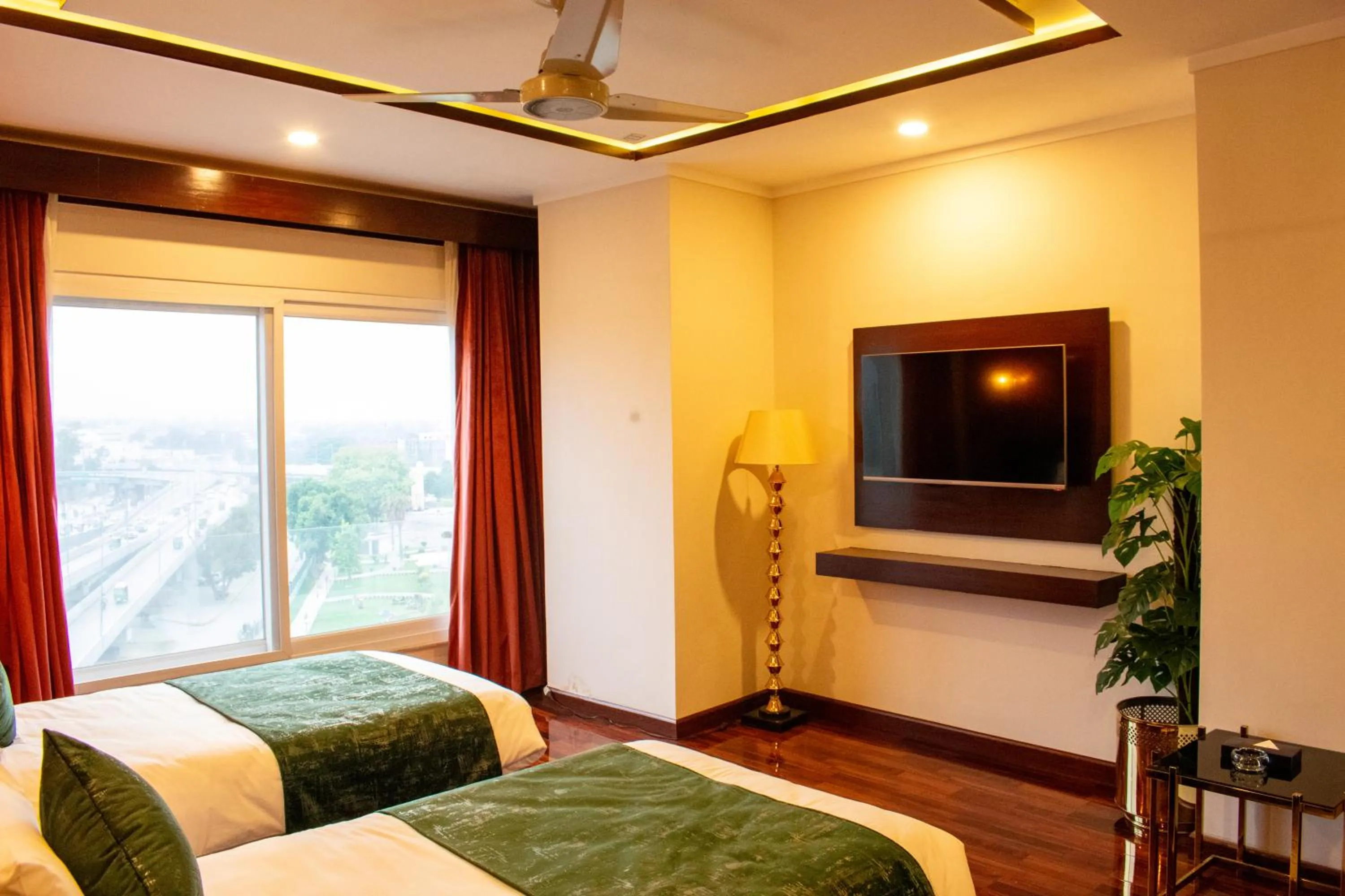 Photo of the whole room, Bed in Hotel Tourmaline Peshawar