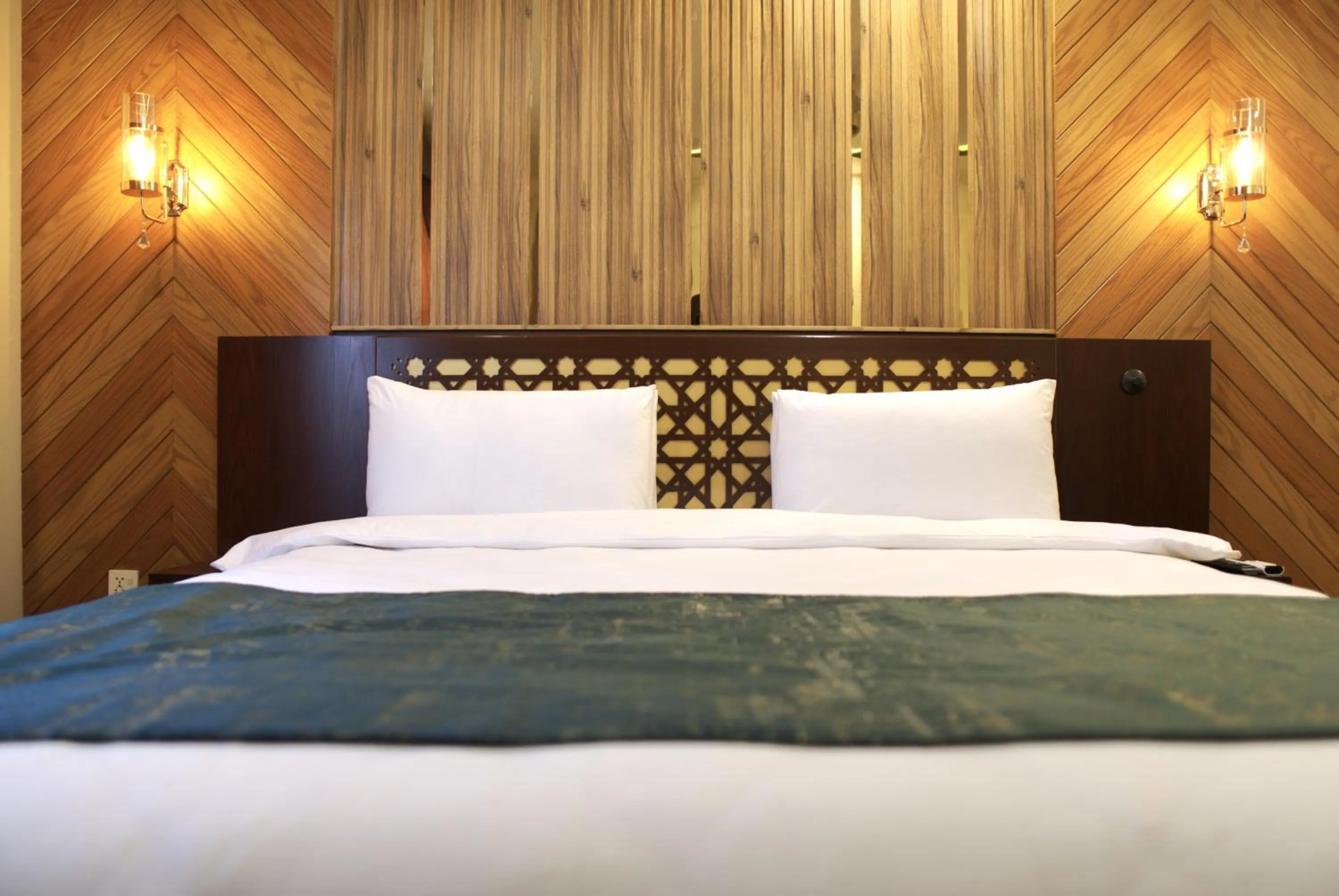 Bed in Hotel Tourmaline Peshawar