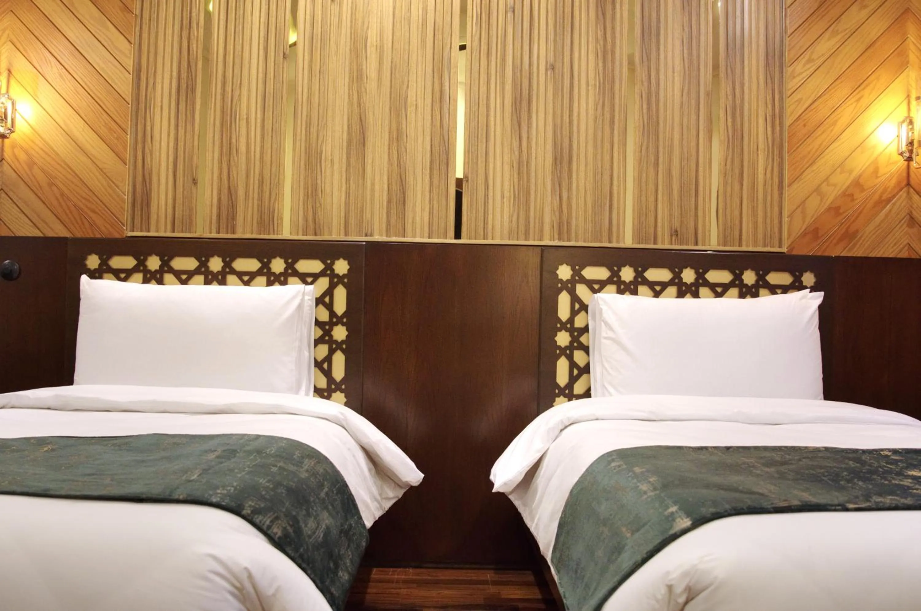 Bed in Hotel Tourmaline Peshawar