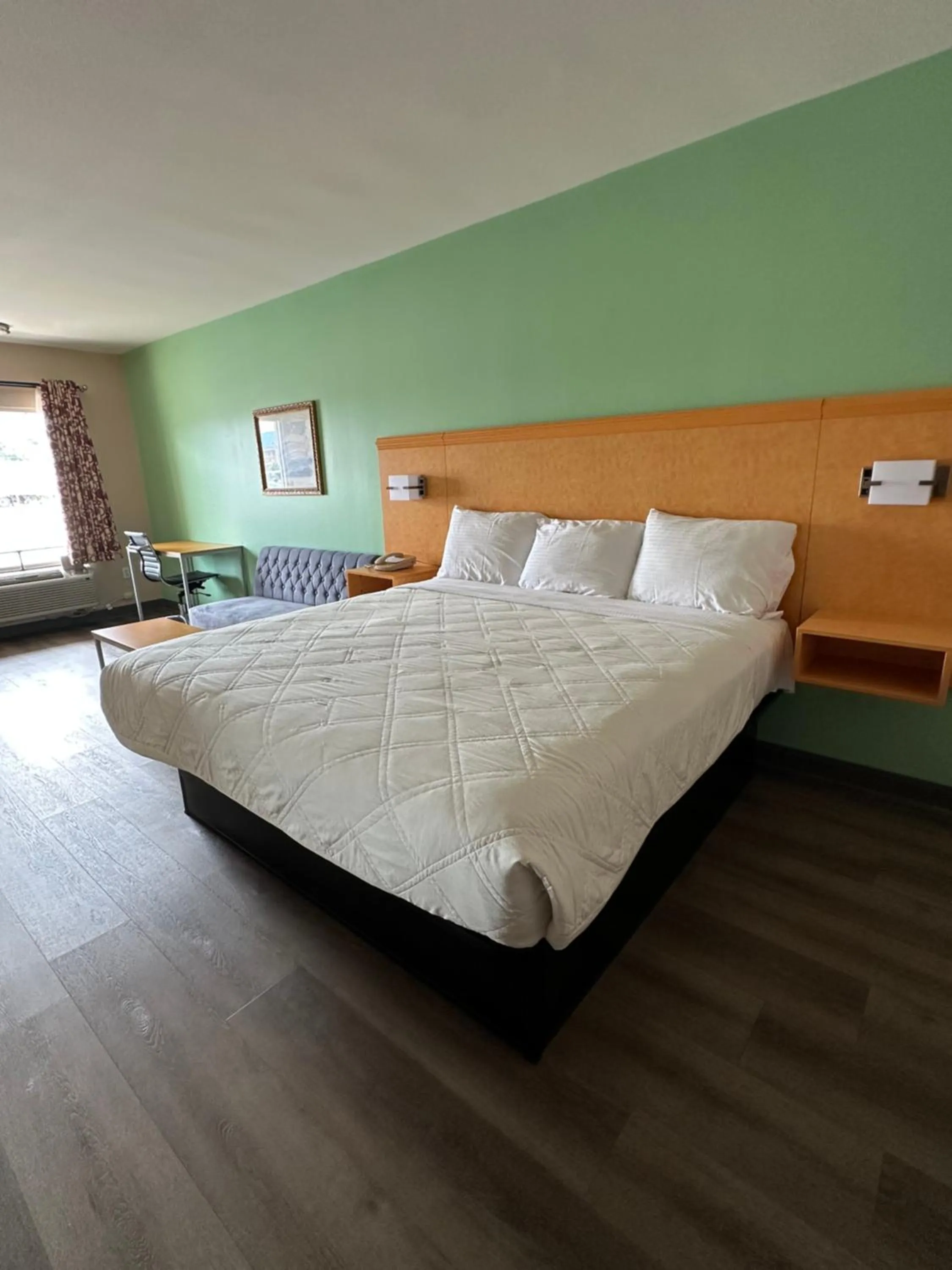 Bed in Security Inn and Suites