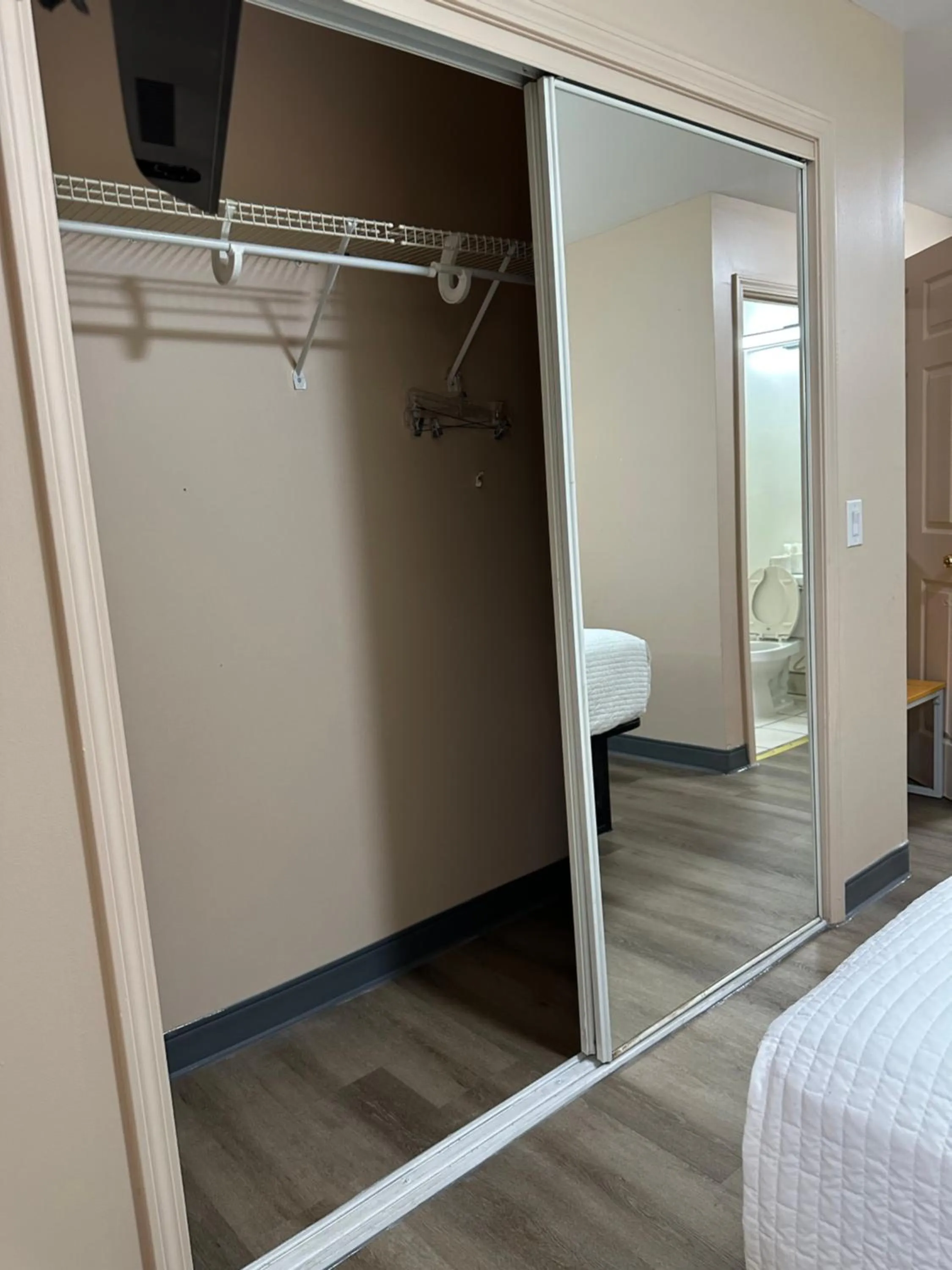 Bed in Security Inn and Suites