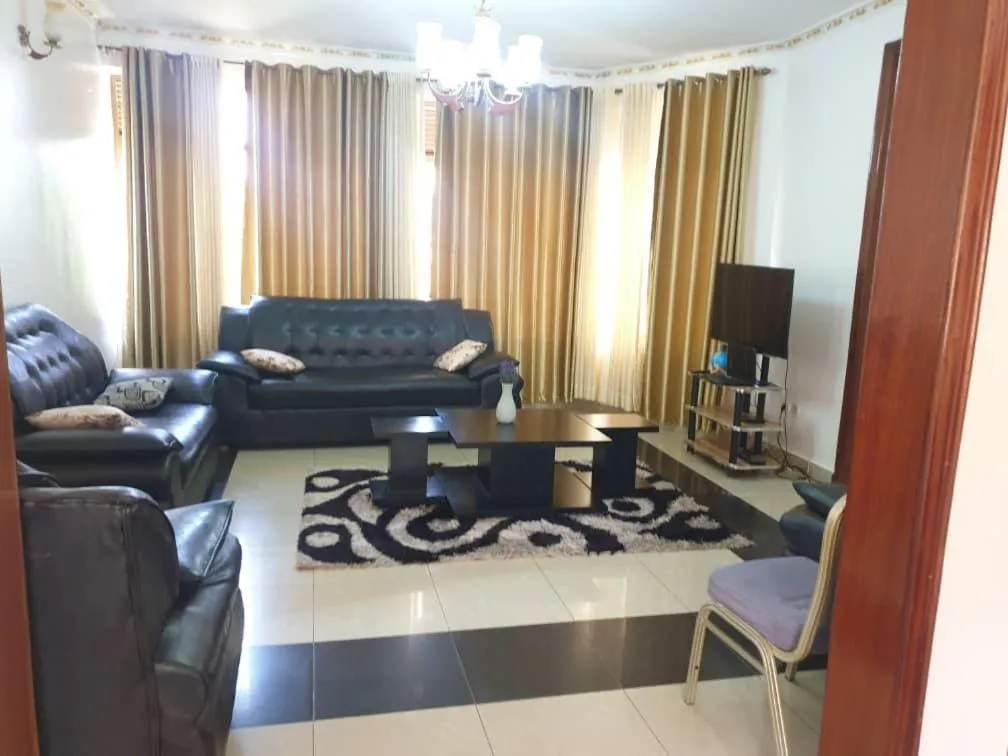 Communal lounge/ TV room in The 3K Guest House