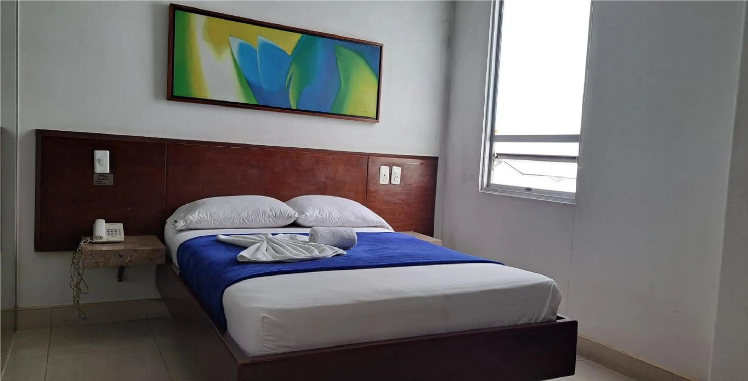 Bed in Hotel Romanza