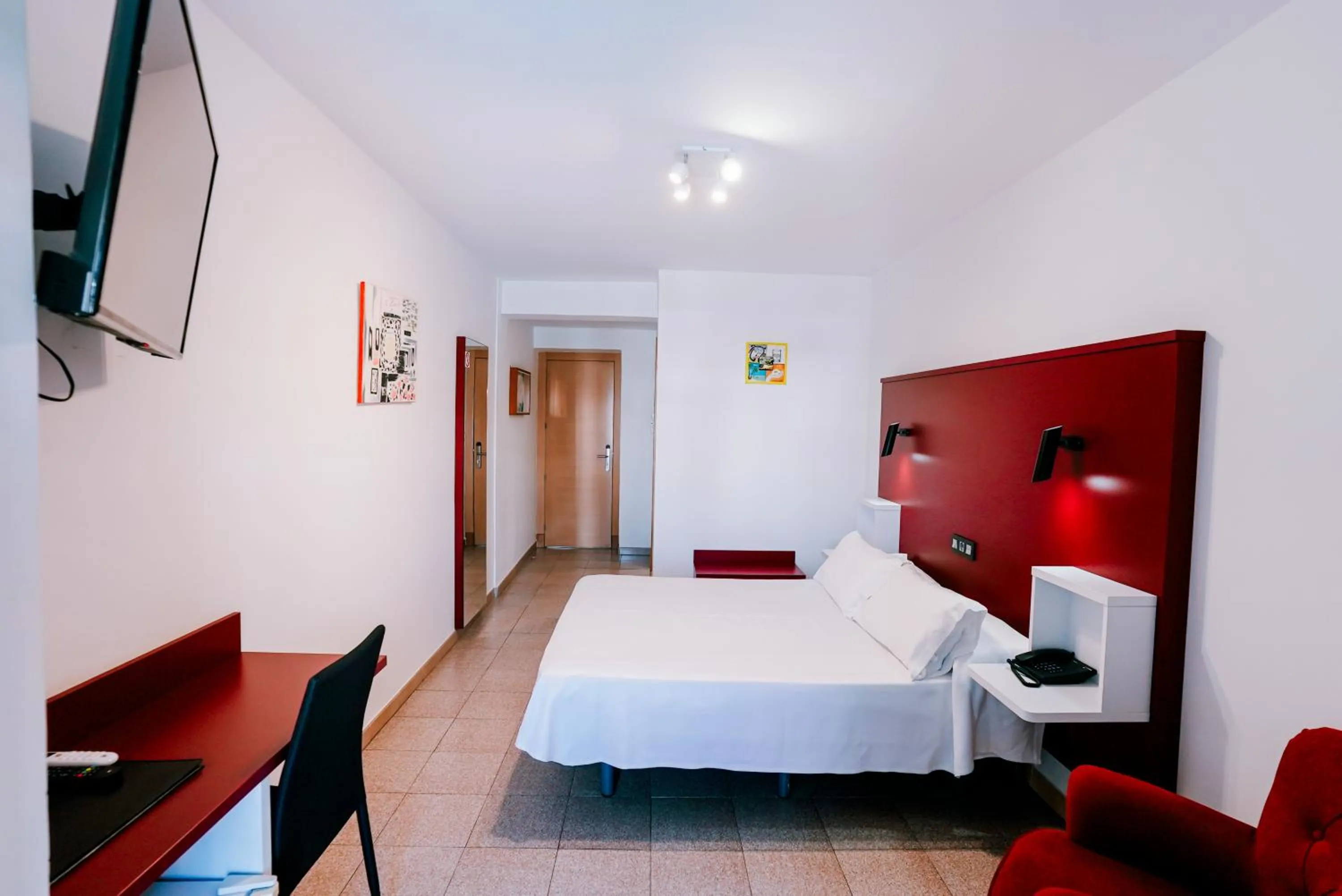 Bed in Hospedium Hotel Continental