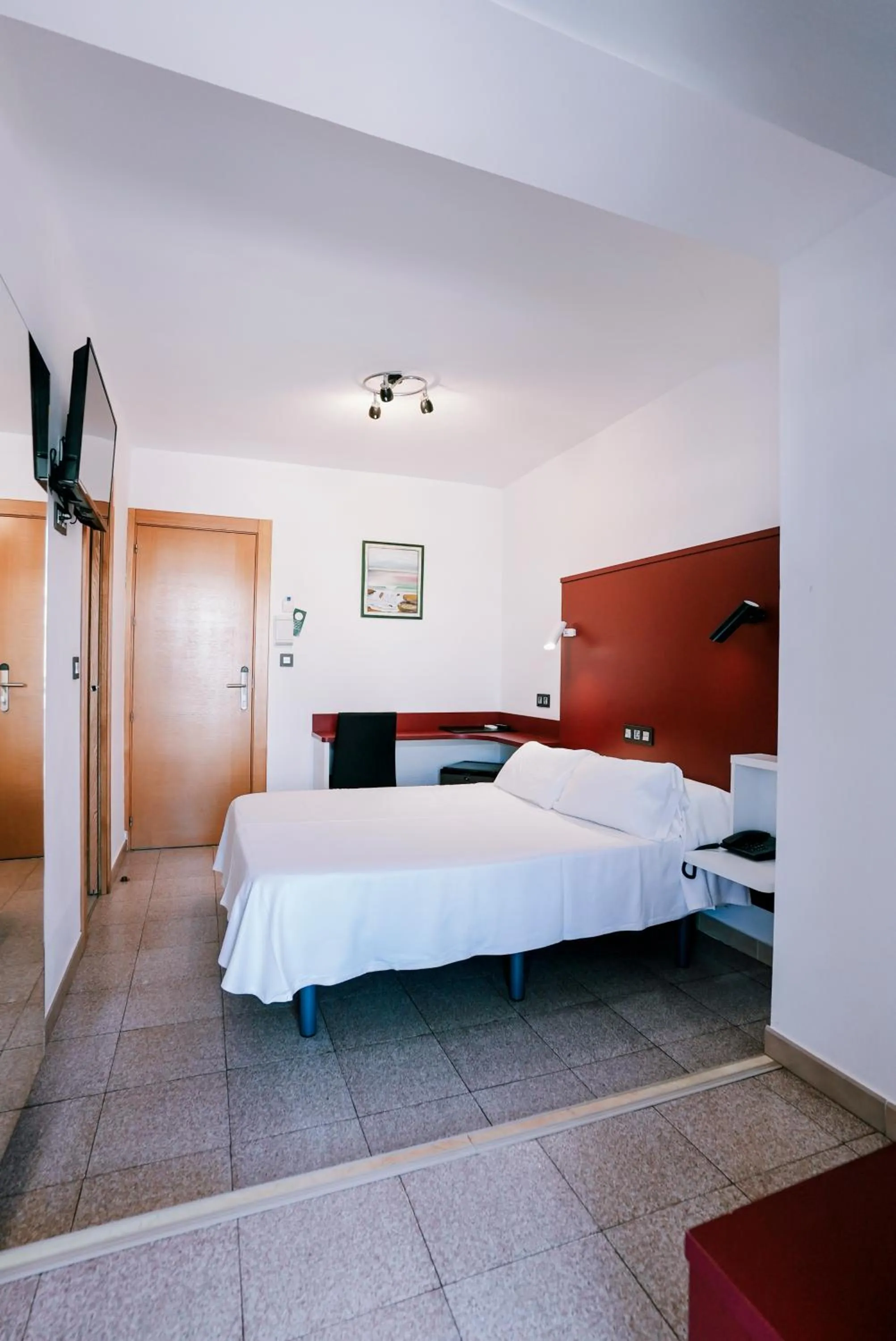 Bed in Hospedium Hotel Continental