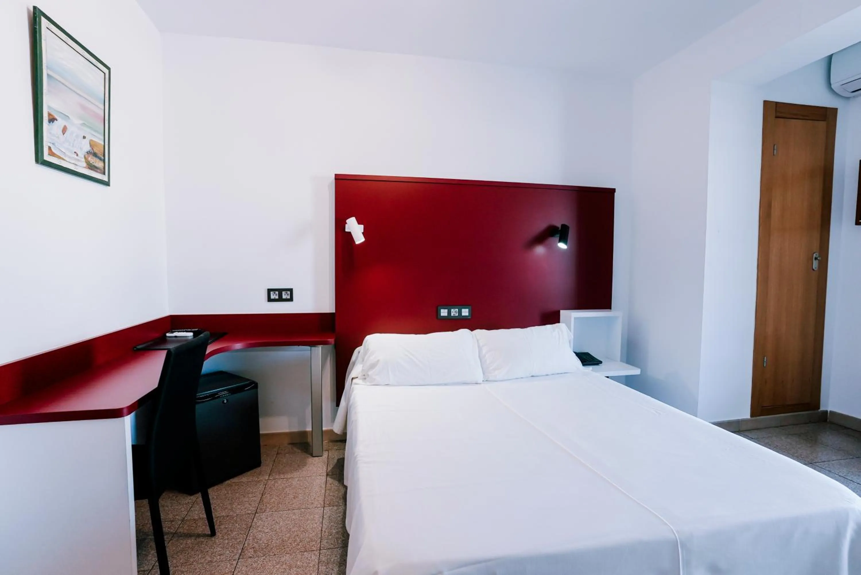 Bed in Hospedium Hotel Continental