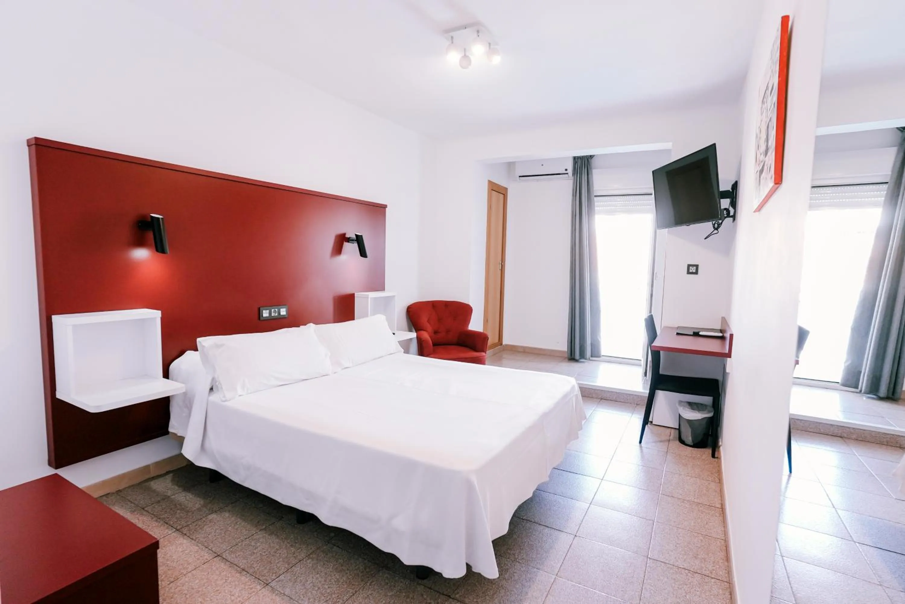 Bed in Hospedium Hotel Continental