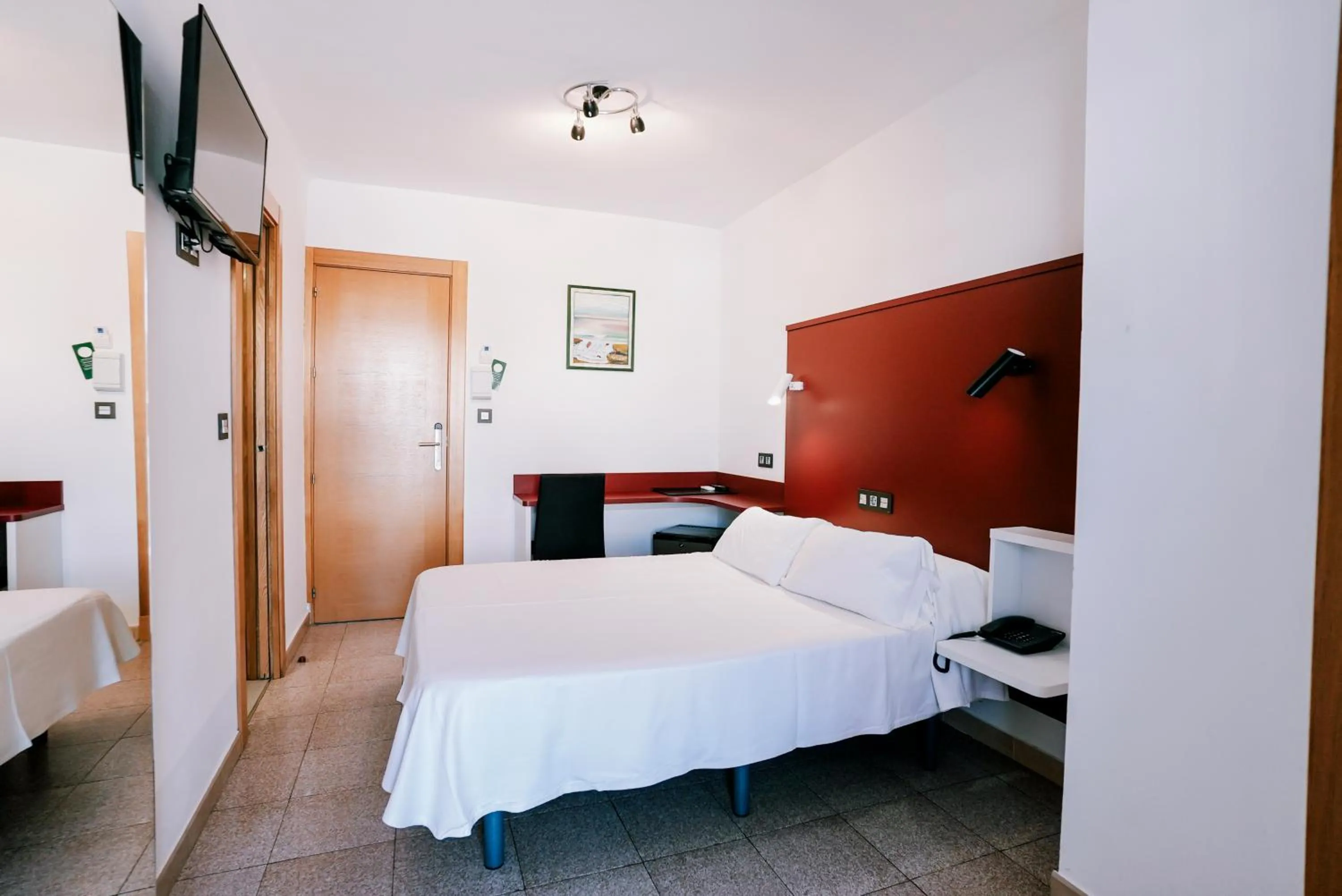 Bed in Hospedium Hotel Continental