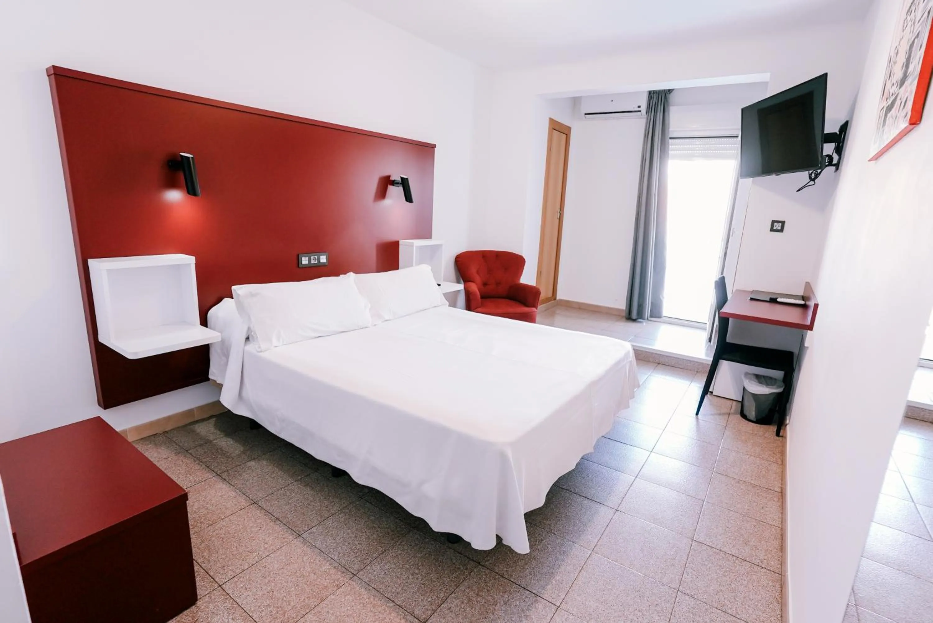 Bed in Hospedium Hotel Continental