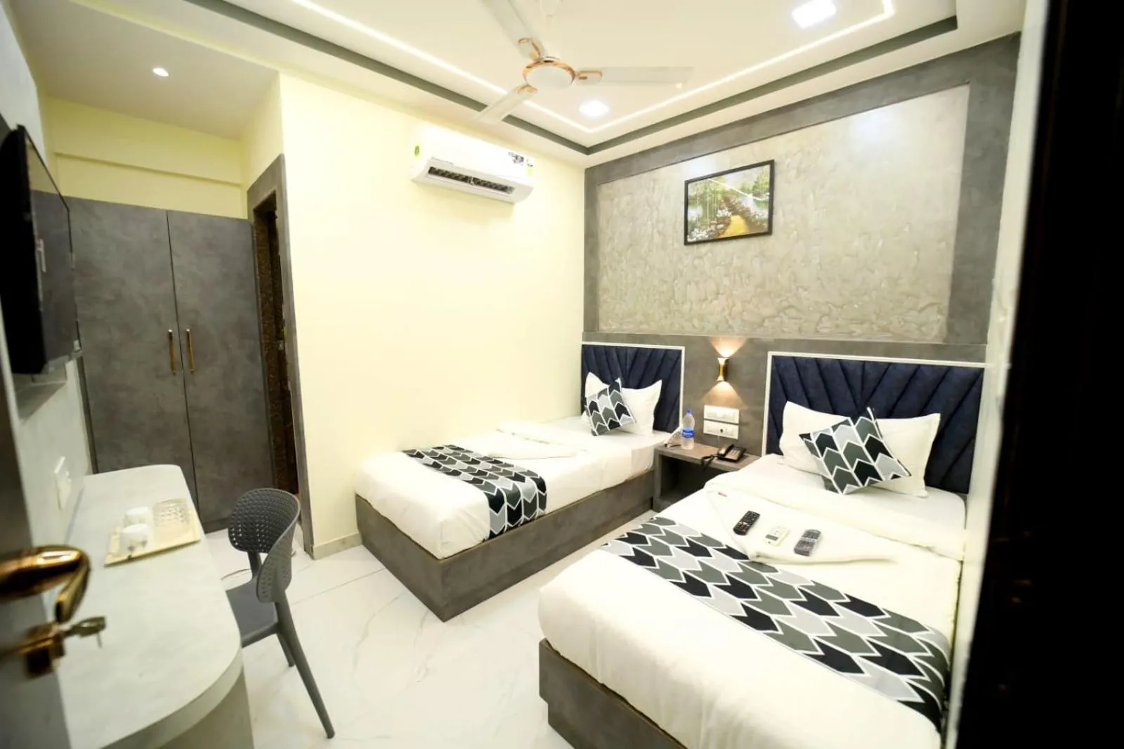 Photo of the whole room, Bed in N.M. Hotel