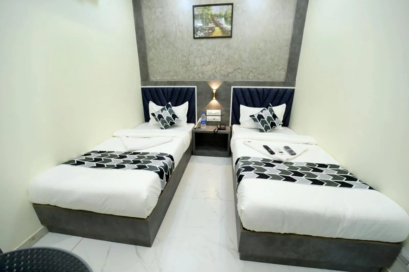 Photo of the whole room, Bed in N.M. Hotel