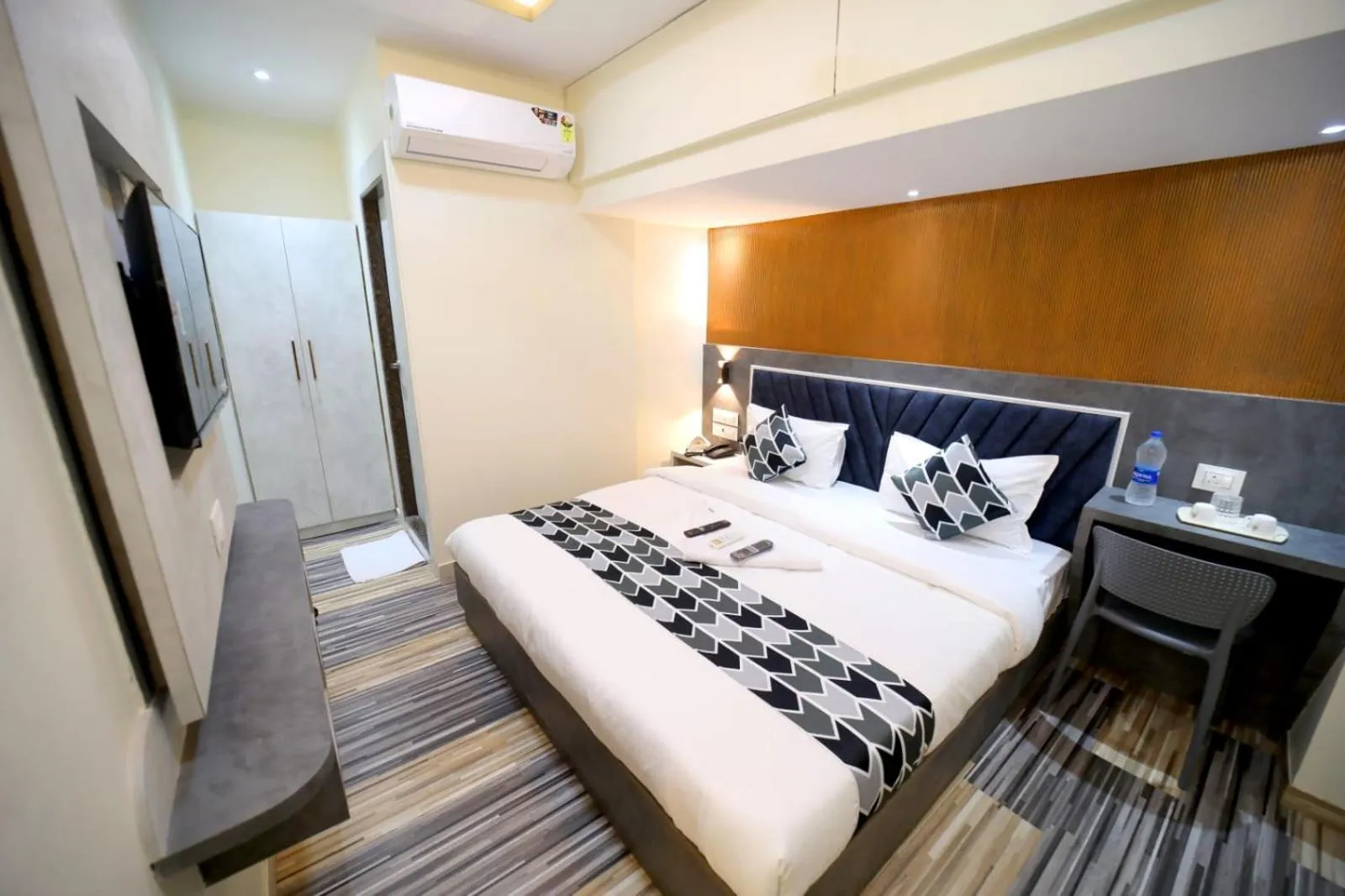 Photo of the whole room, Bed in N.M. Hotel