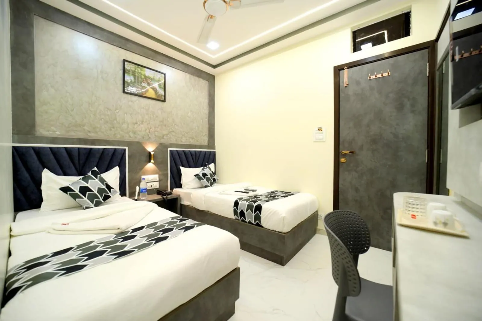 Photo of the whole room, Bed in N.M. Hotel