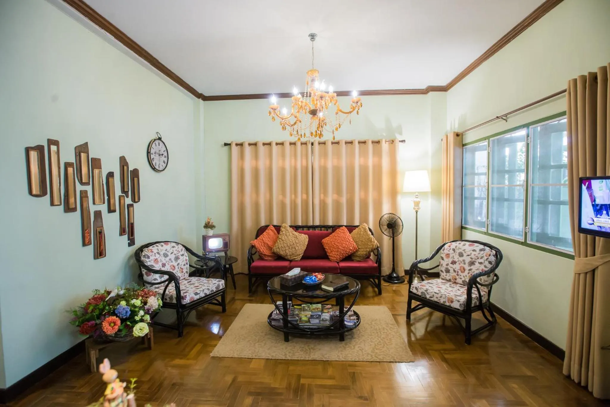 Communal lounge/ TV room in Iroom Boutique House