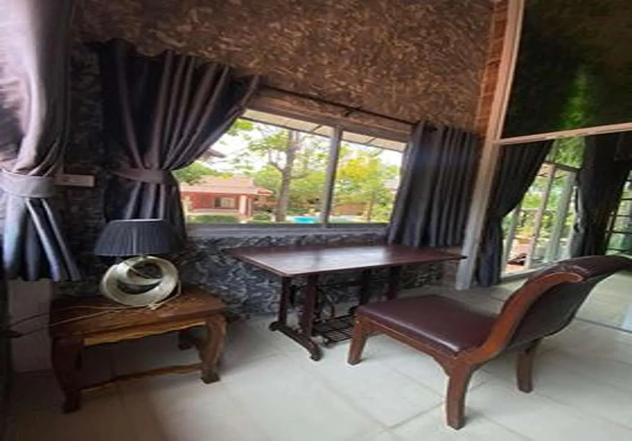 Seating area in Phalaburi resort by dreamhouse