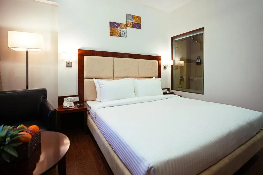 Bedroom, Bed in Ramee The Srinivas Palace