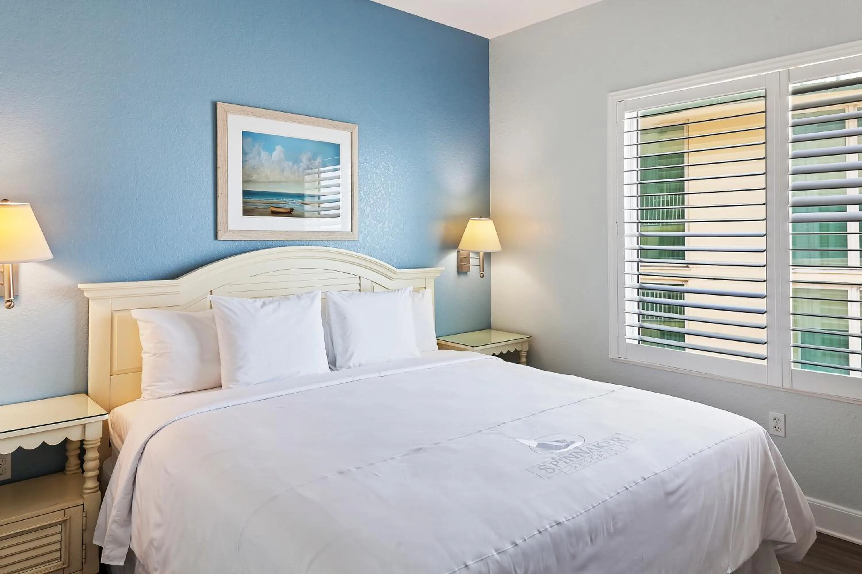 Bed in Royal Floridian Resort South by Spinnaker