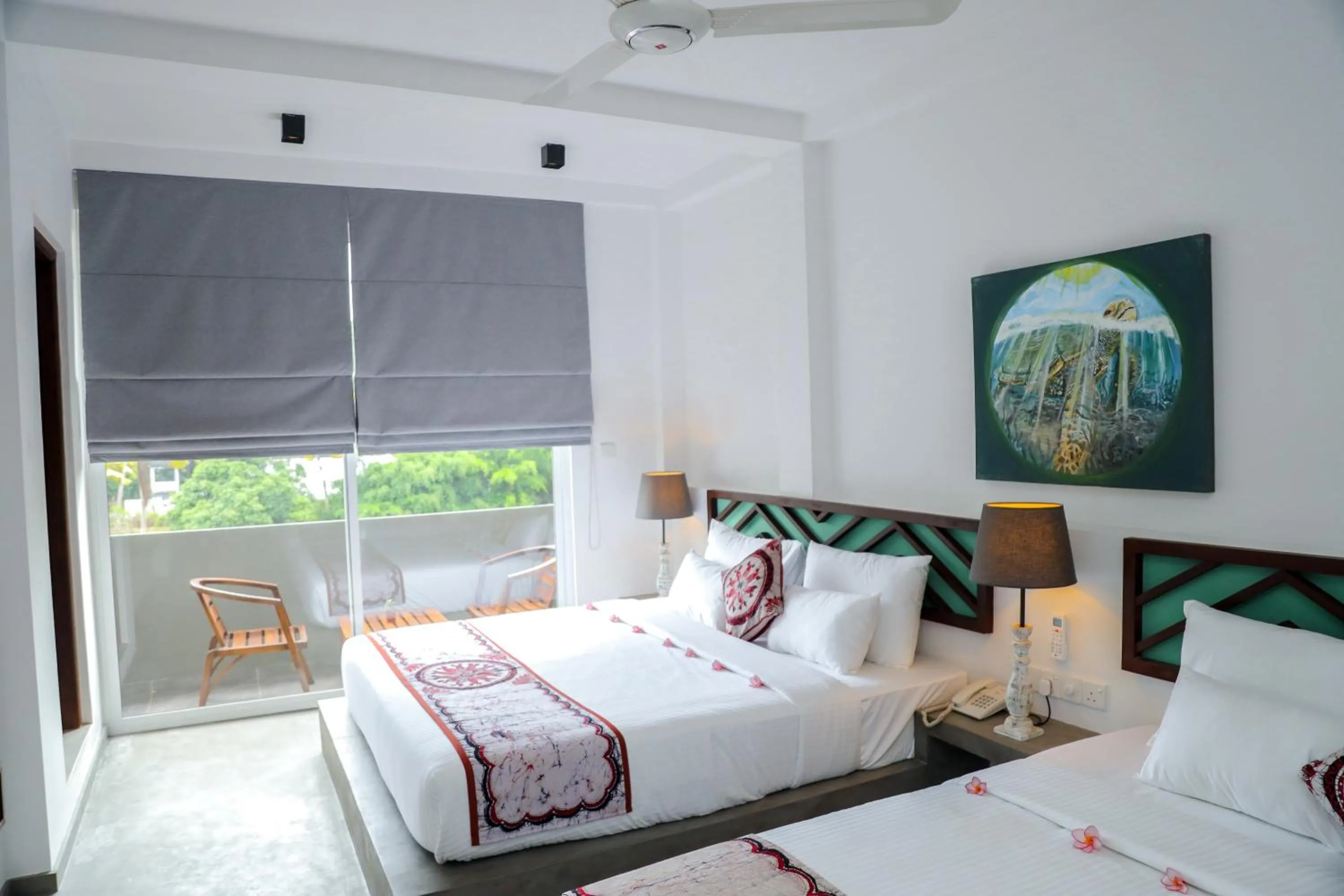 Bed in The Chariot Hikkduwa Resort