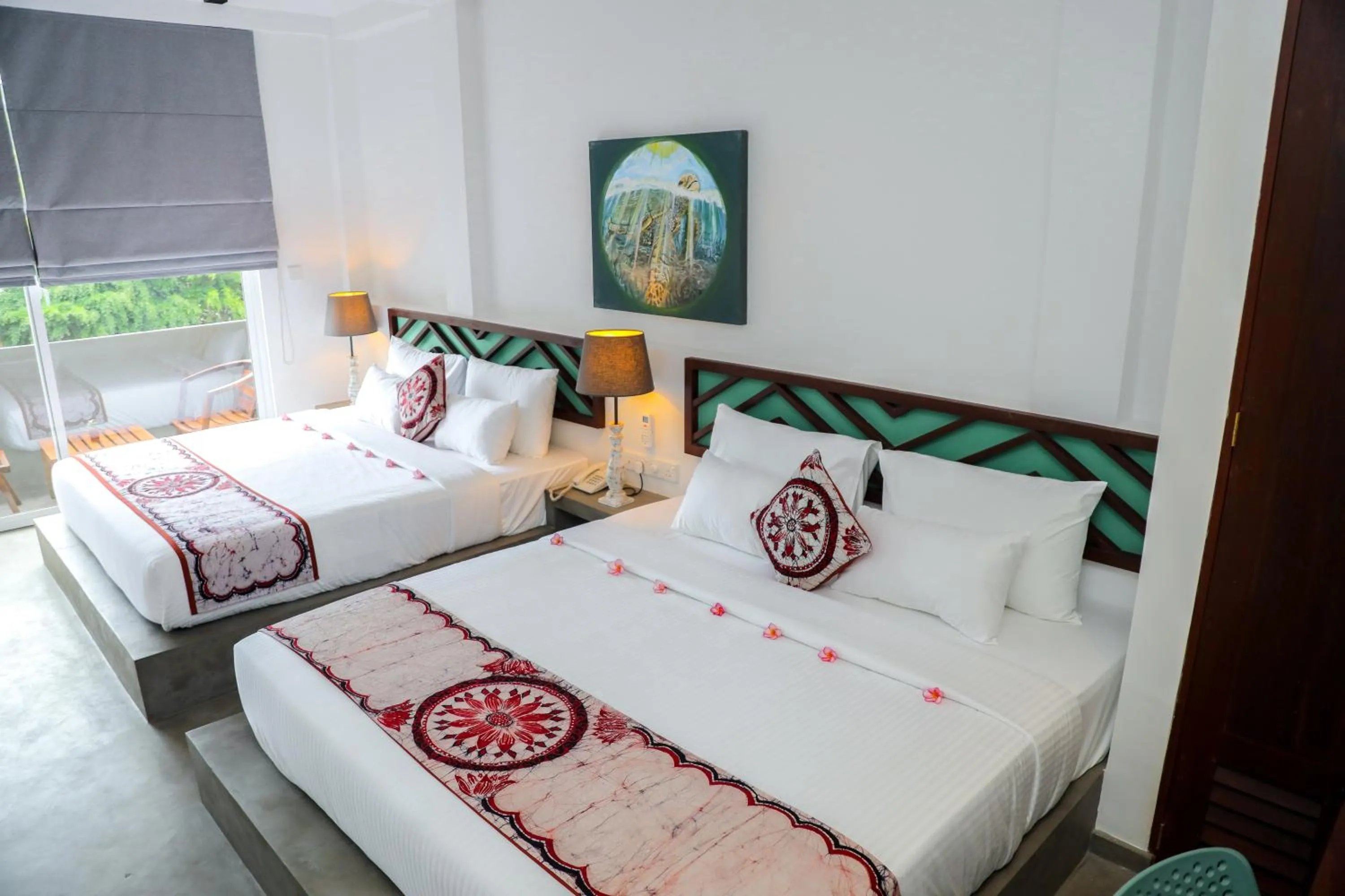 Bed in The Chariot Hikkduwa Resort