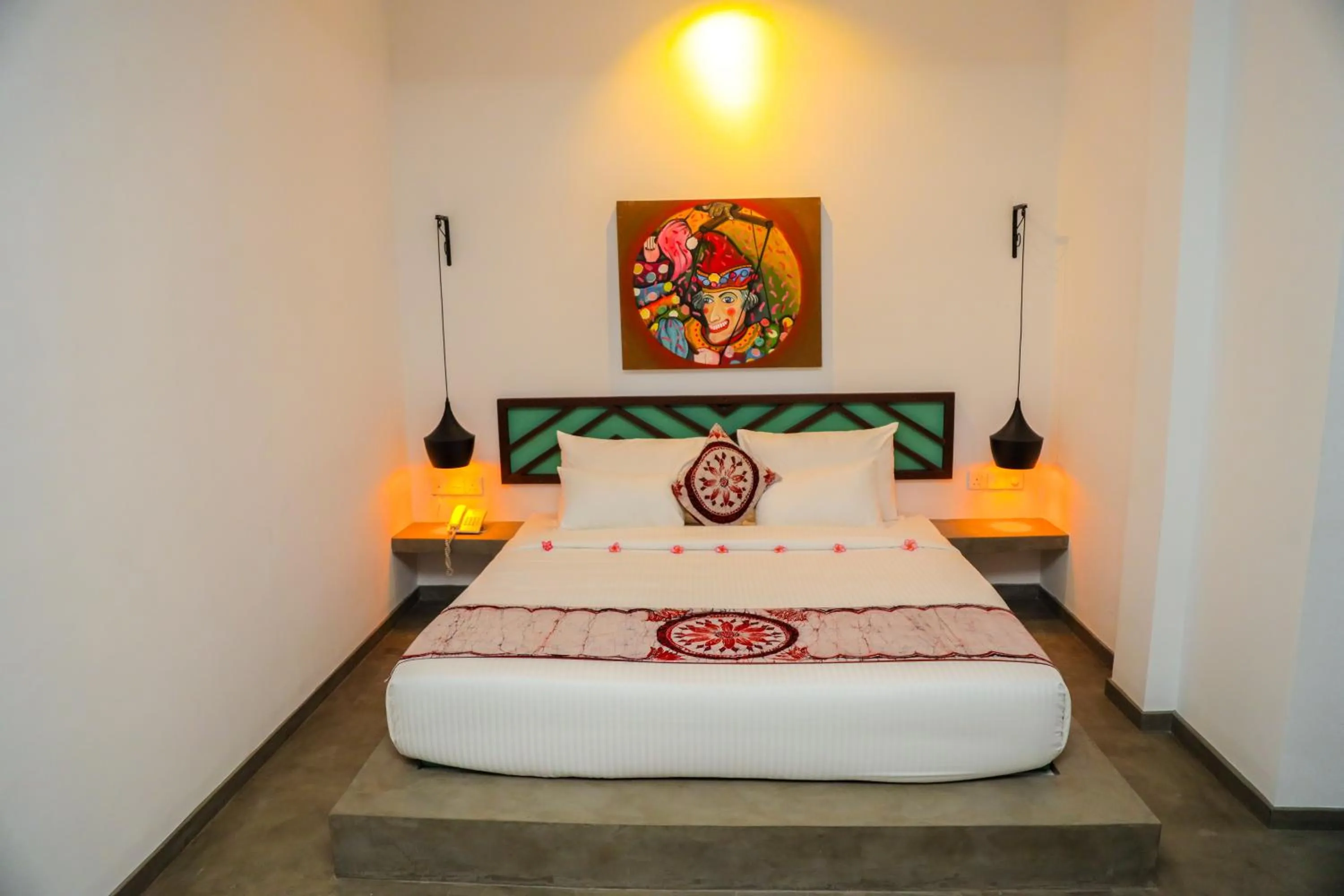 Bed in The Chariot Hikkduwa Resort