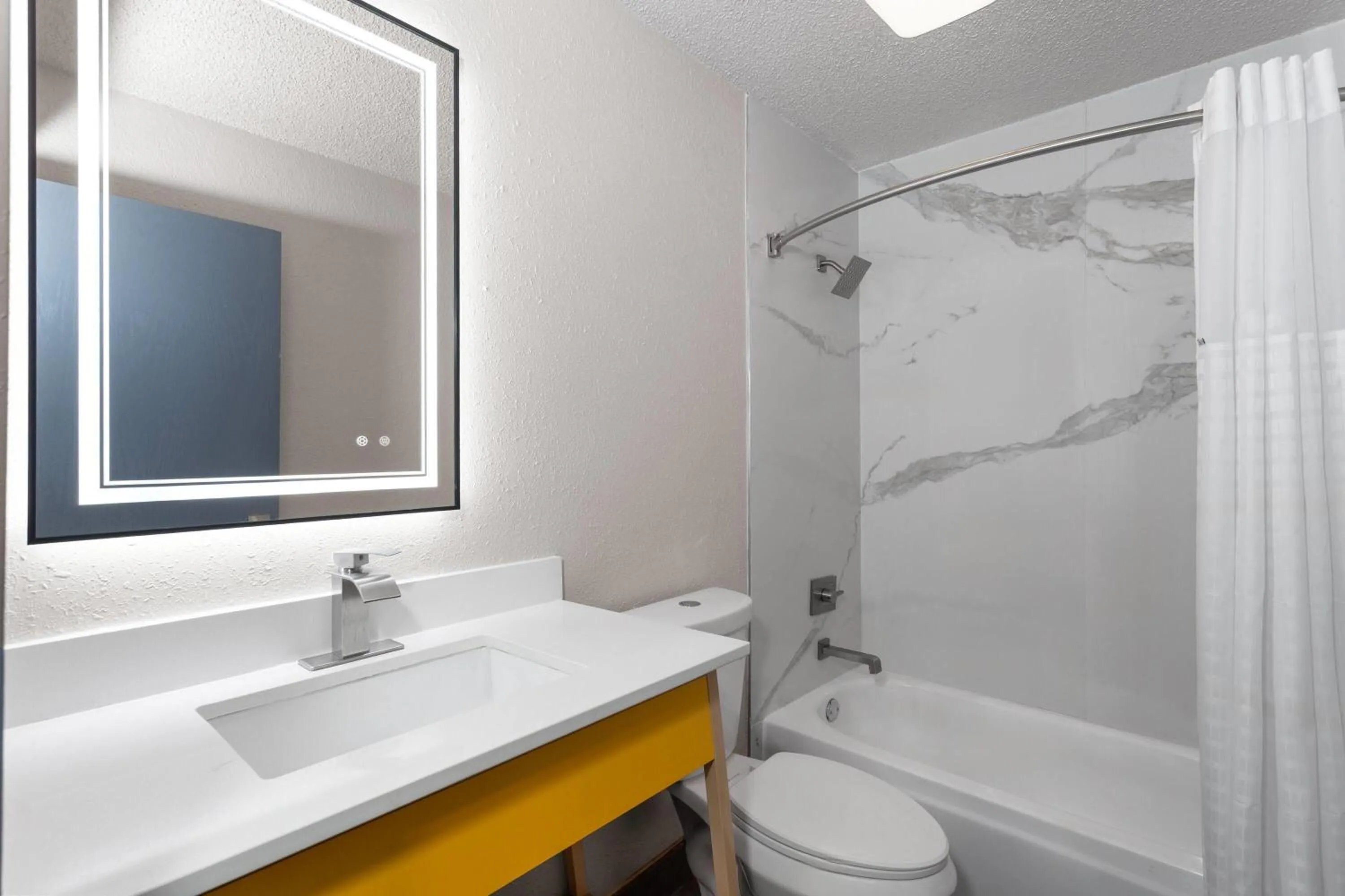 Bathroom in Days Inn by Wyndham Waukegan
