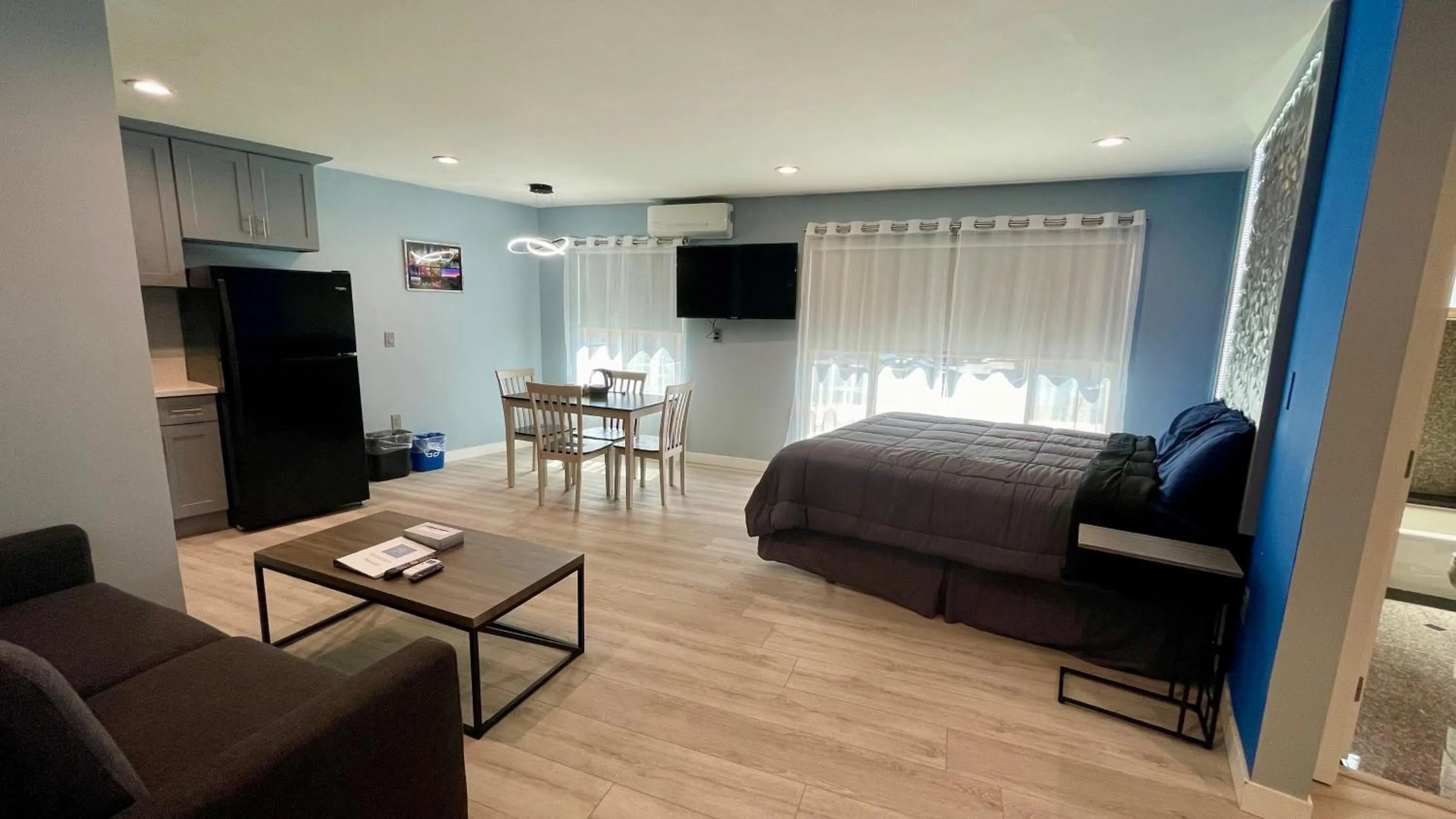 Bed in Quintessence ApartHotel