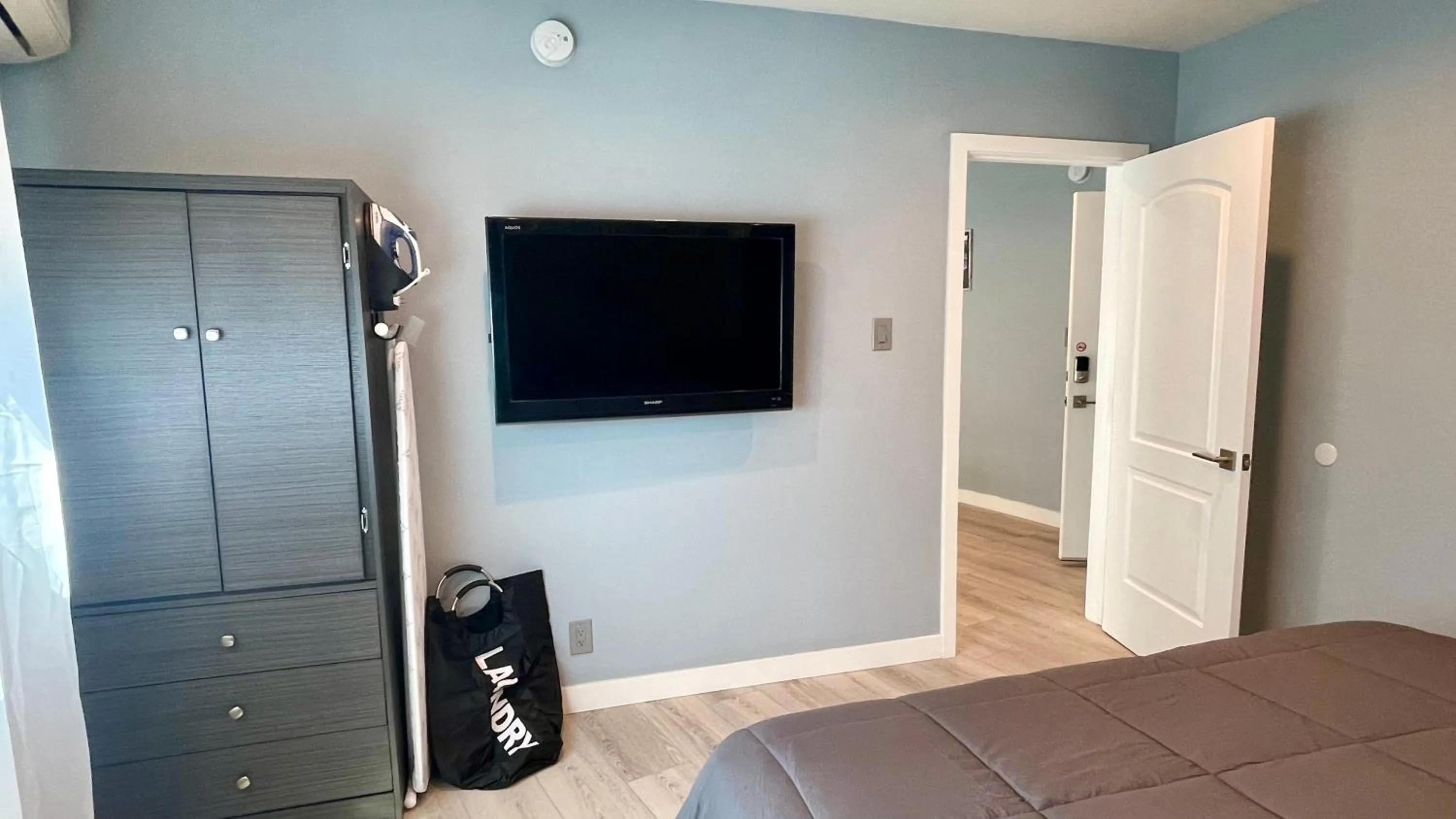 Bed in Quintessence ApartHotel