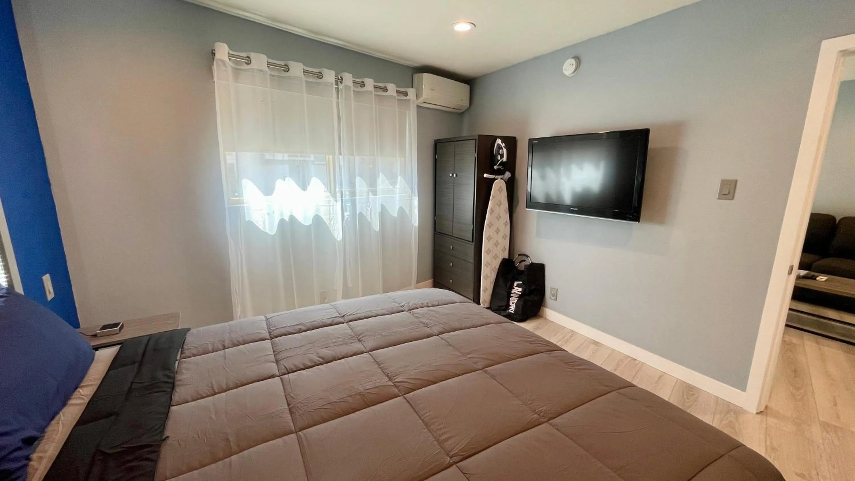 Bed in Quintessence ApartHotel