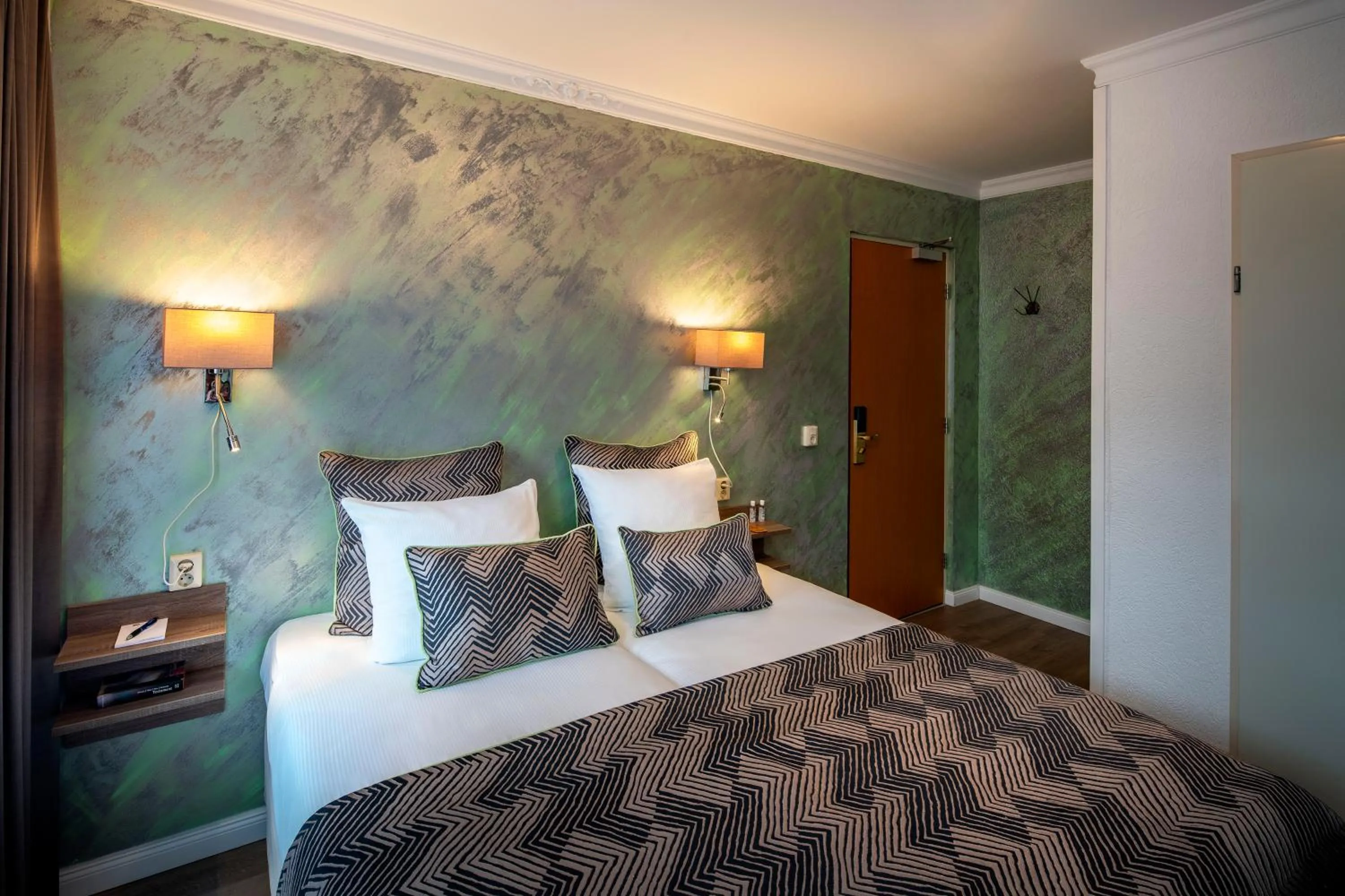 Bed in Jupiter Hotel