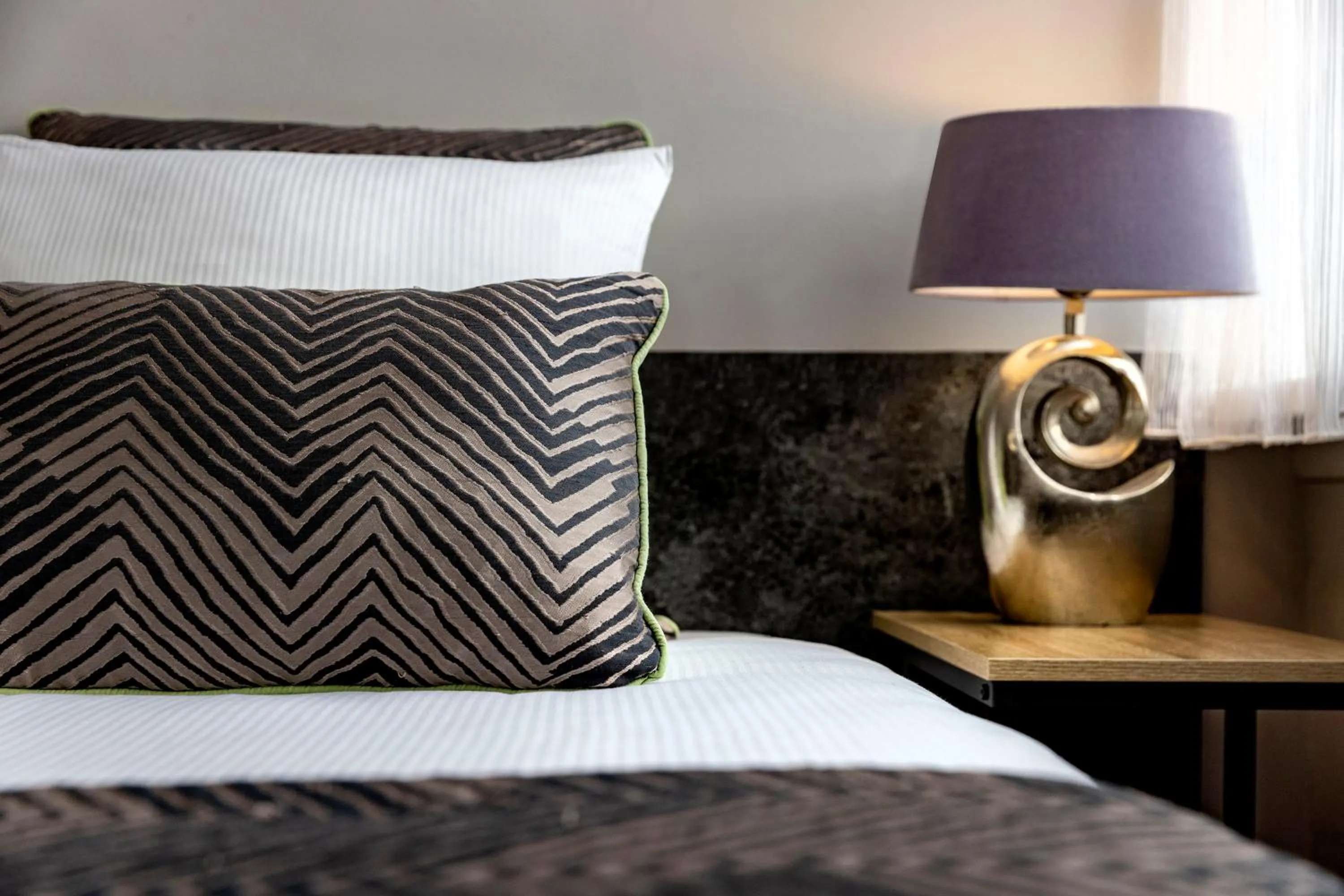 Bed in Jupiter Hotel