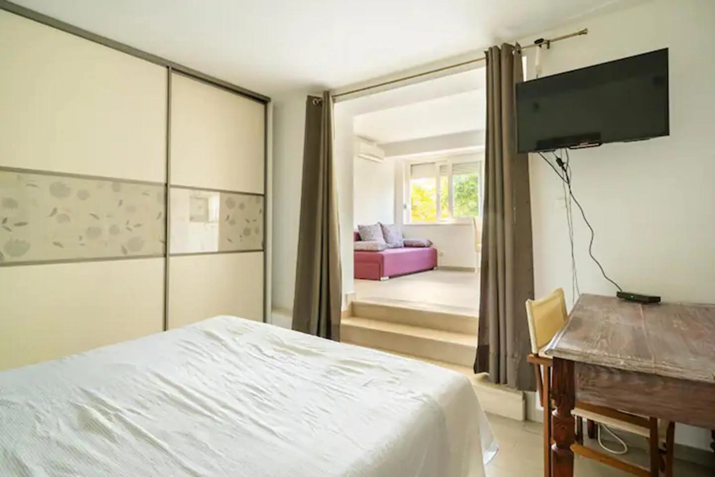 Bed in Studio Apartment Lemon